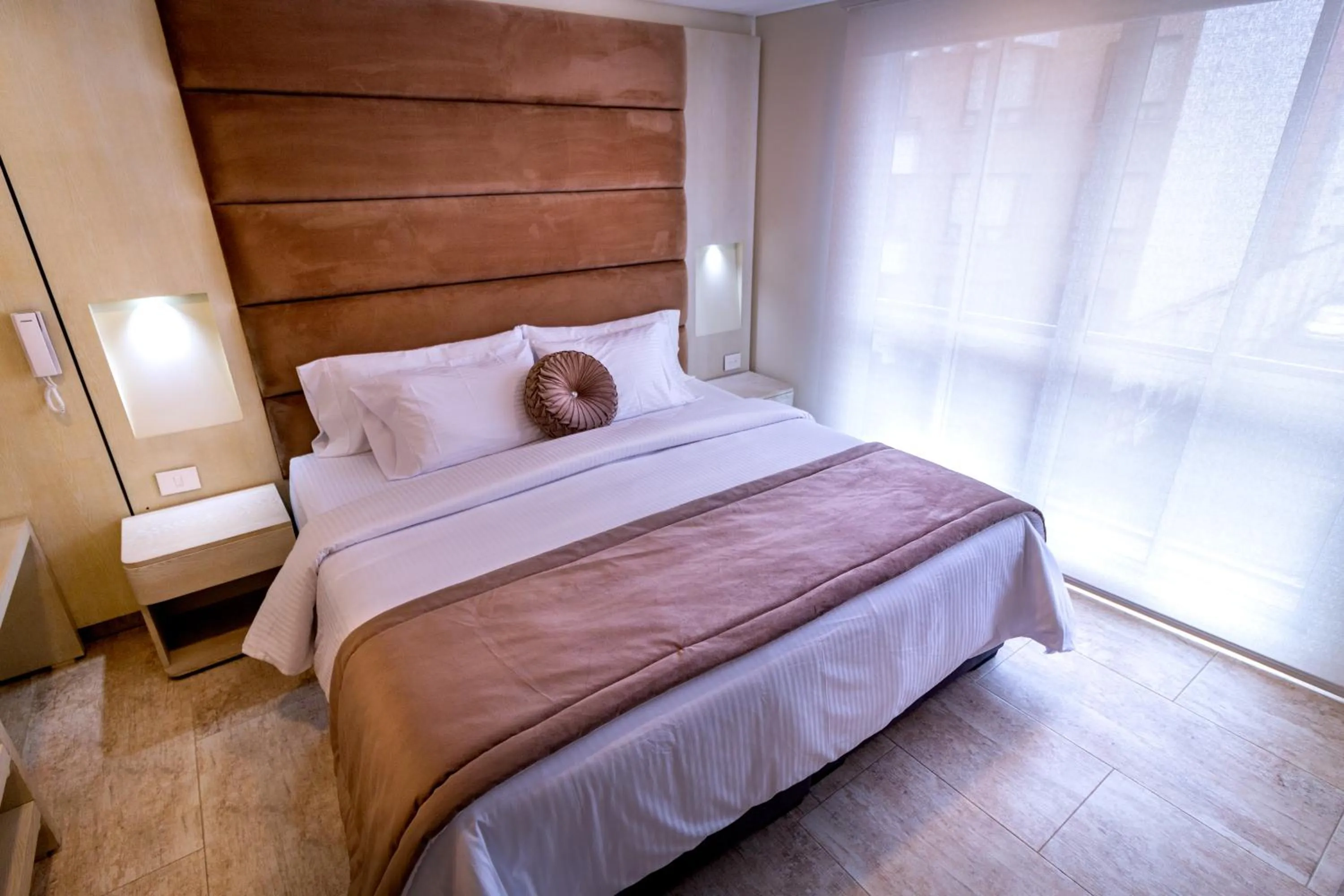 Bed in Trugo Luxury Rooms