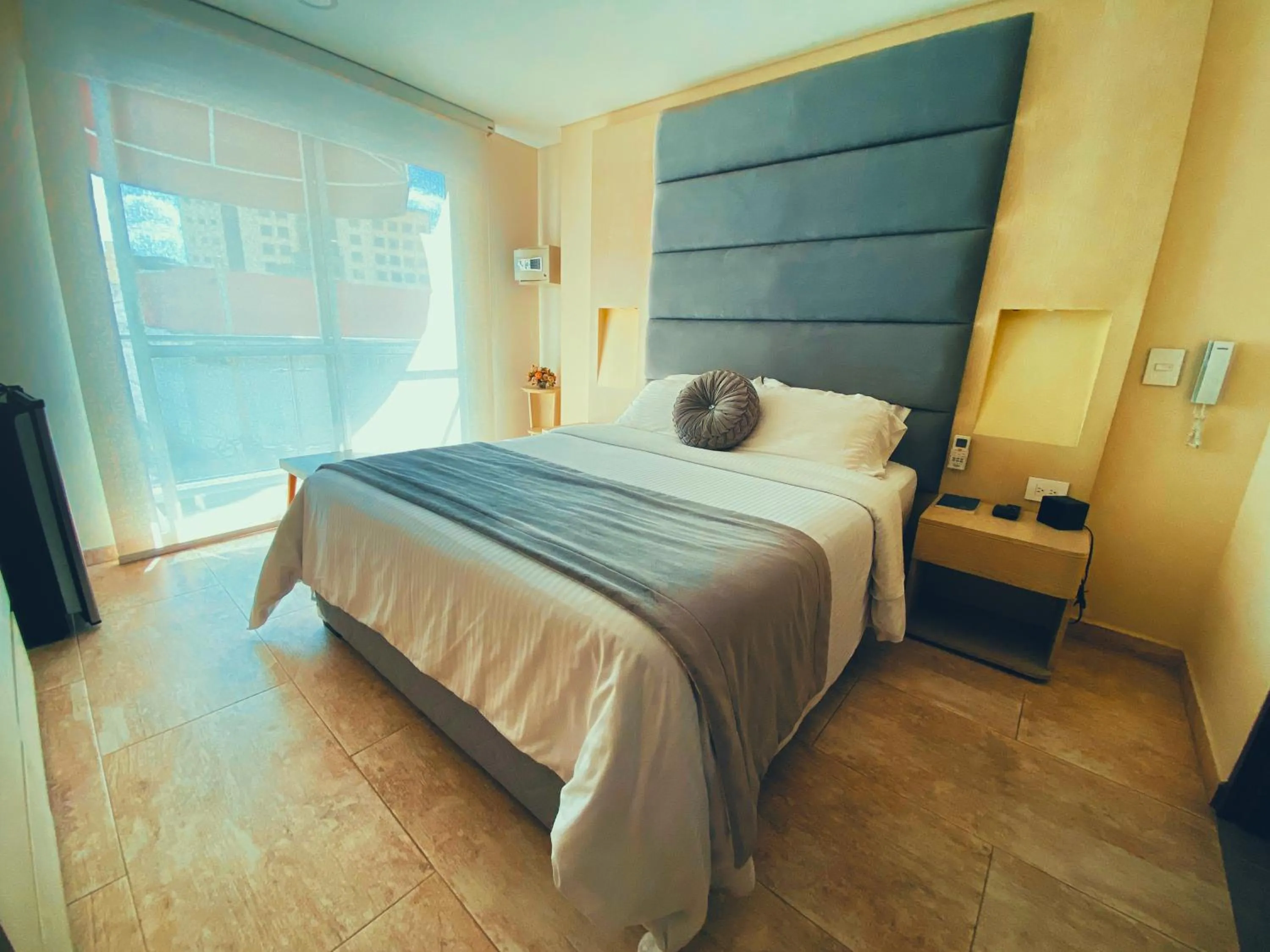 Bed in Trugo Luxury Rooms