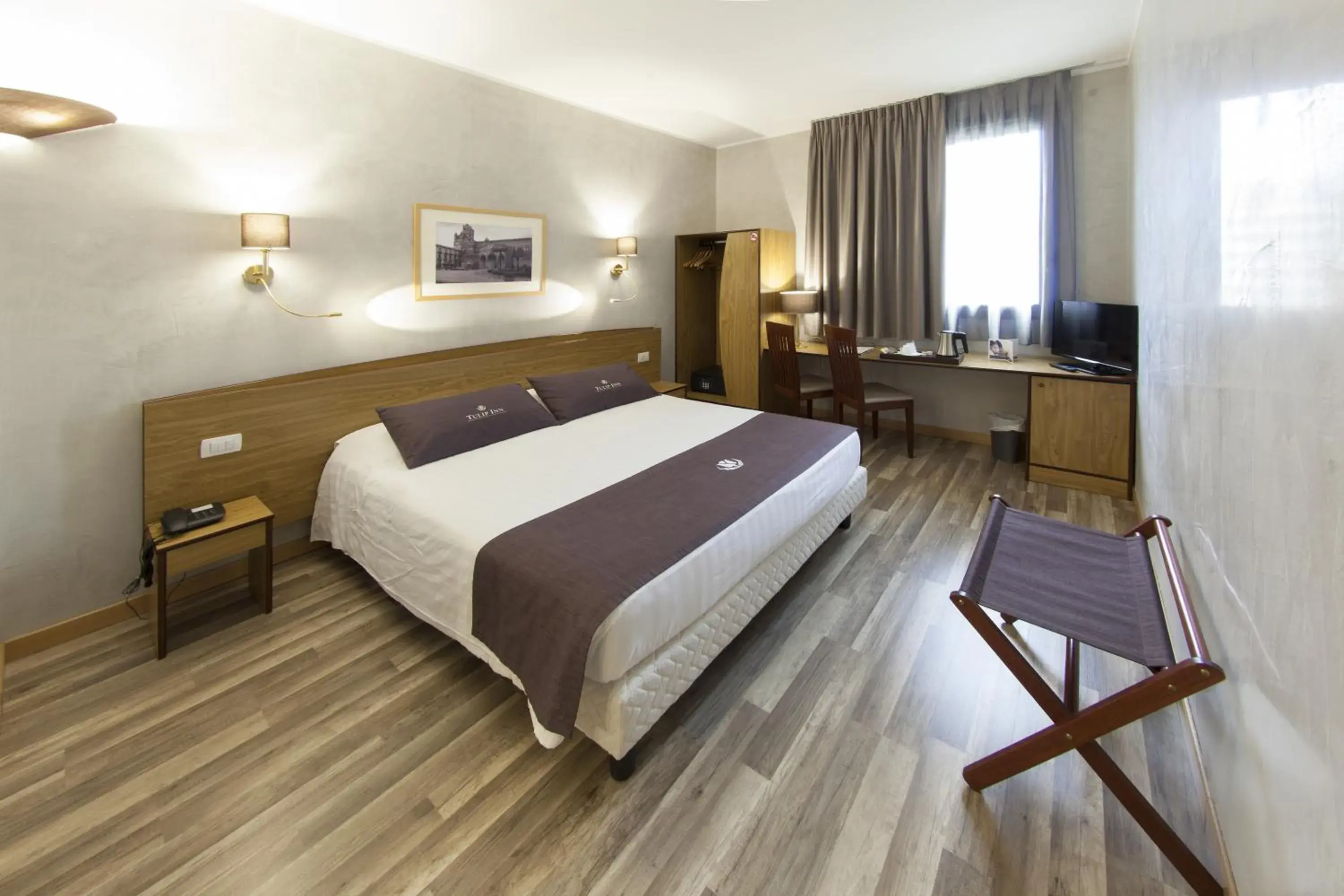Spring, Bed in Tulip Inn Padova Spring, Bed in Tulip Inn Padova