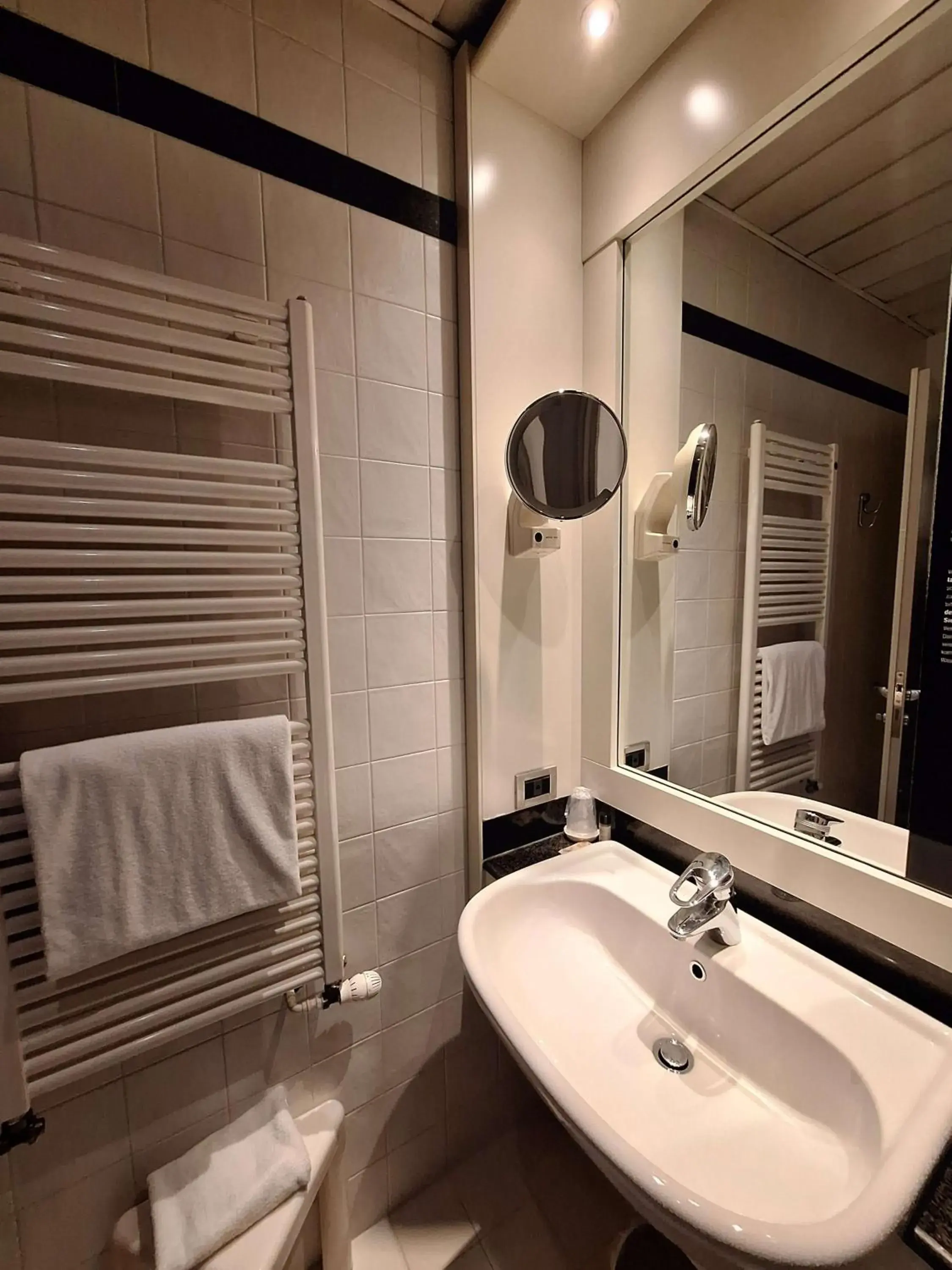 Bathroom in Sure Hotel by Best Western Milano Bathroom in Sure Hotel by Best Western Milano