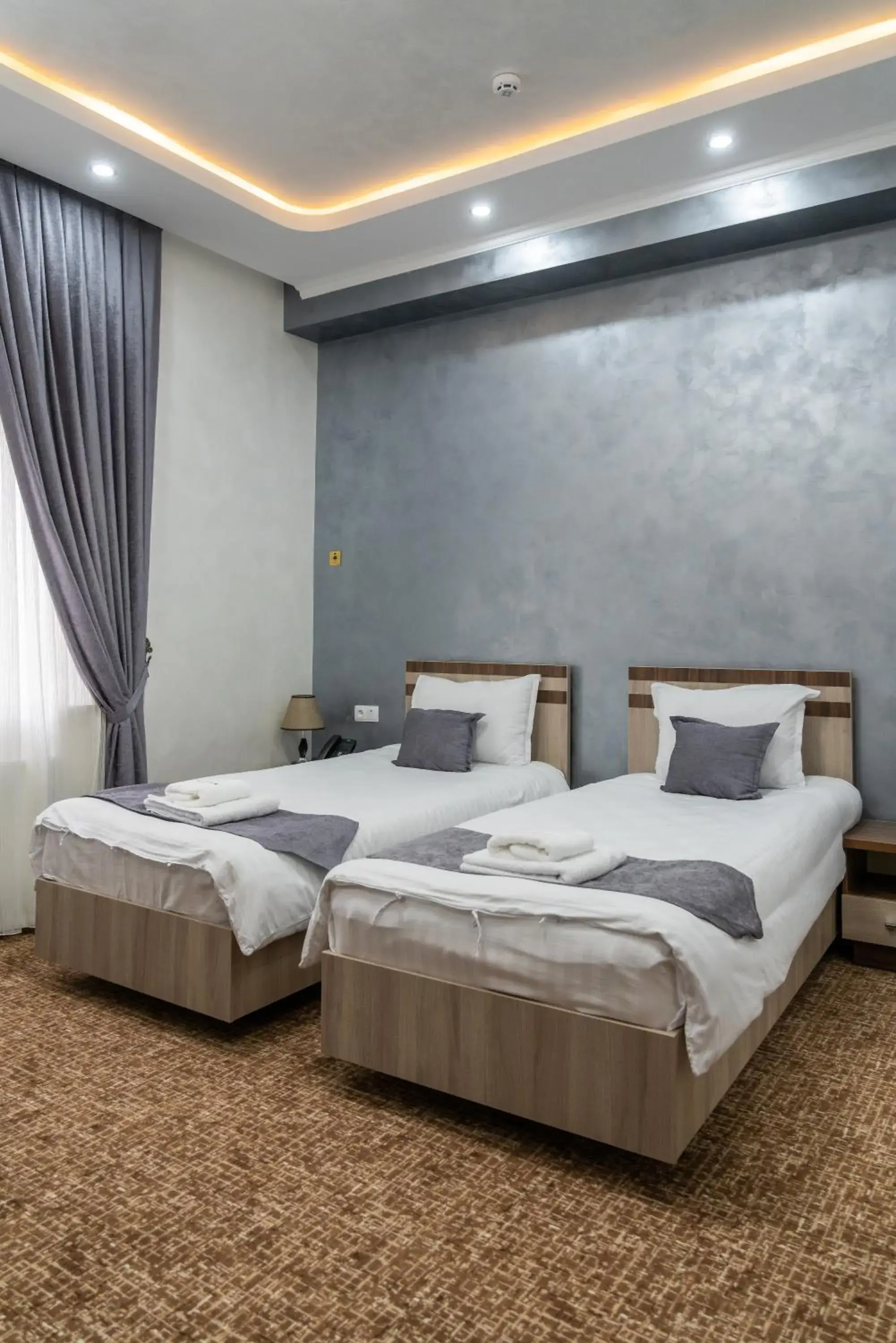 TV and multimedia, Bed in Rayyan Hotel & SPA Tashkent TV and multimedia, Bed in Rayyan Hotel & SPA Tashkent