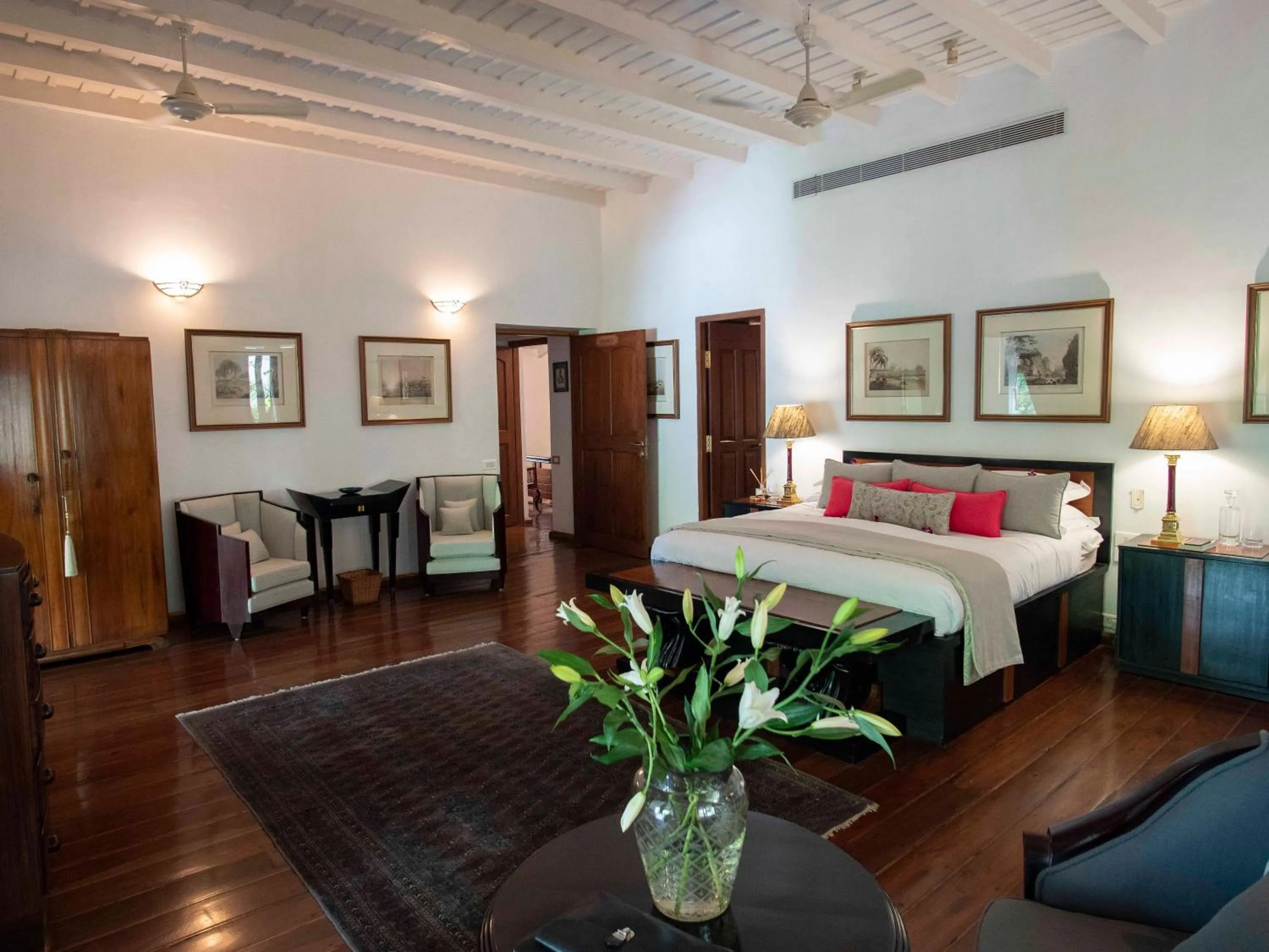 Seating area, Bed in Le Colonial 1506 - Exclusive Luxury Hideaway