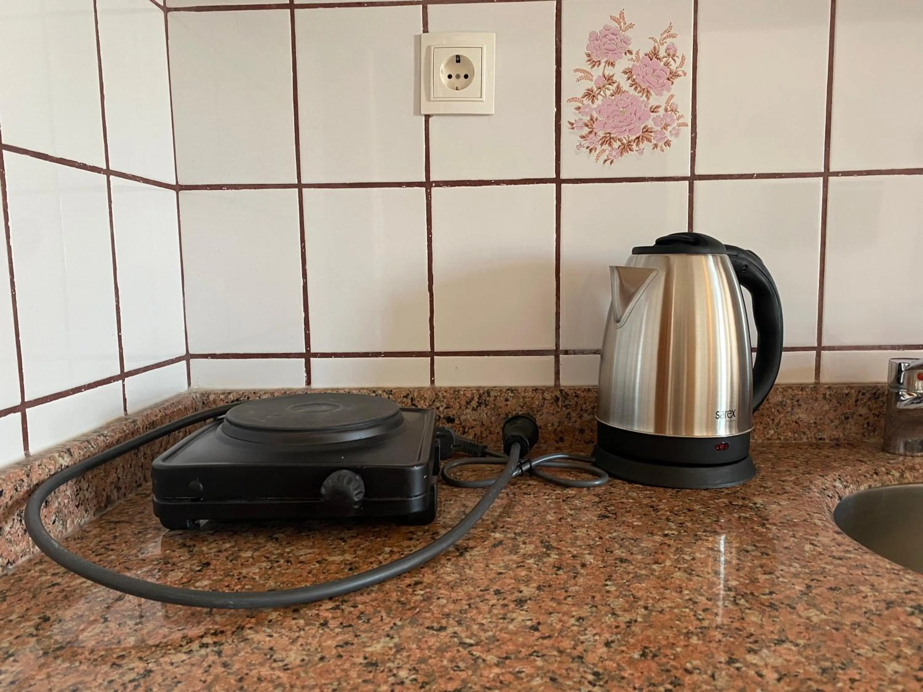 Kitchen or kitchenette in NATURELLA APART HOTEL