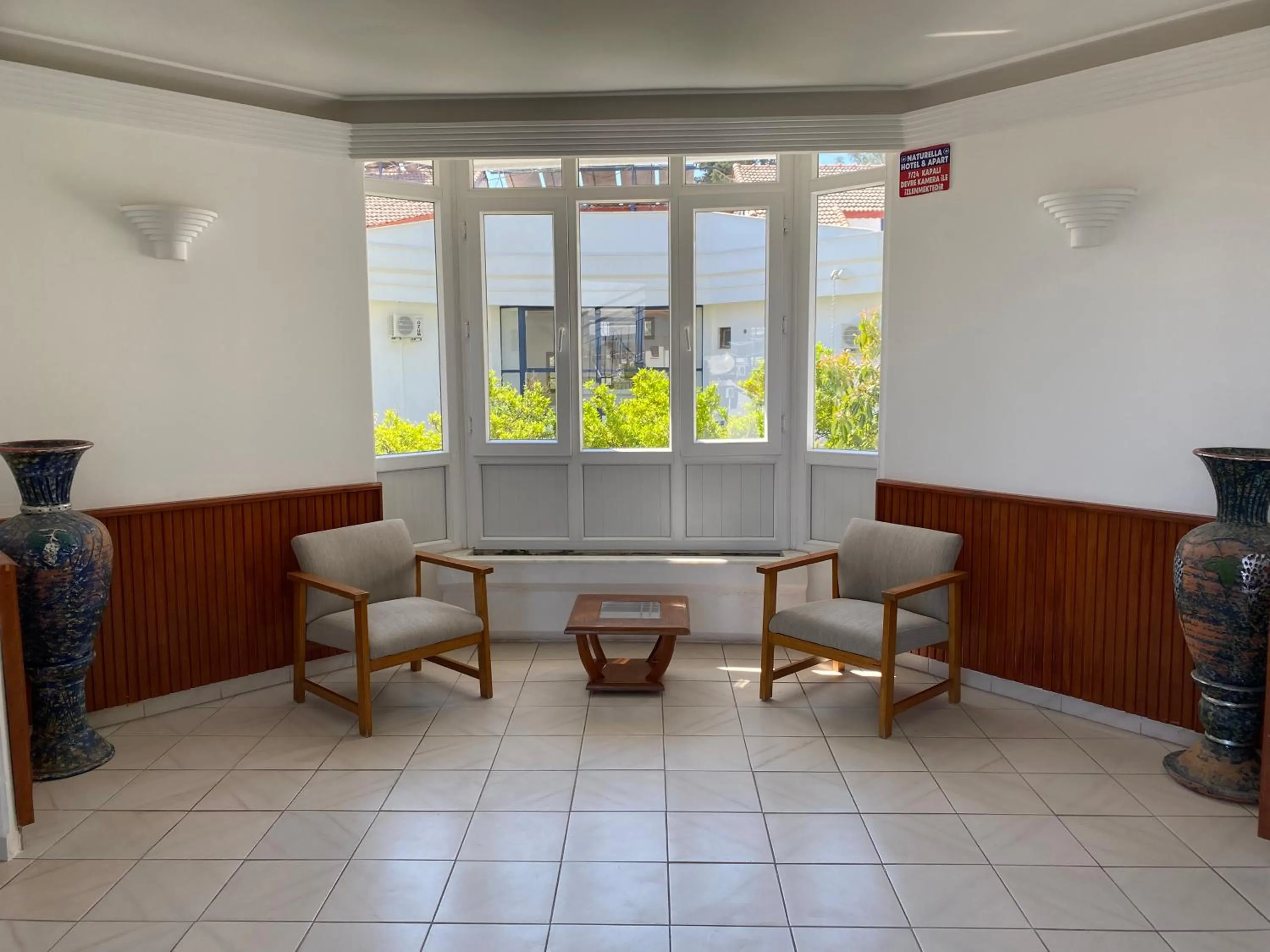 Seating area in NATURELLA APART HOTEL