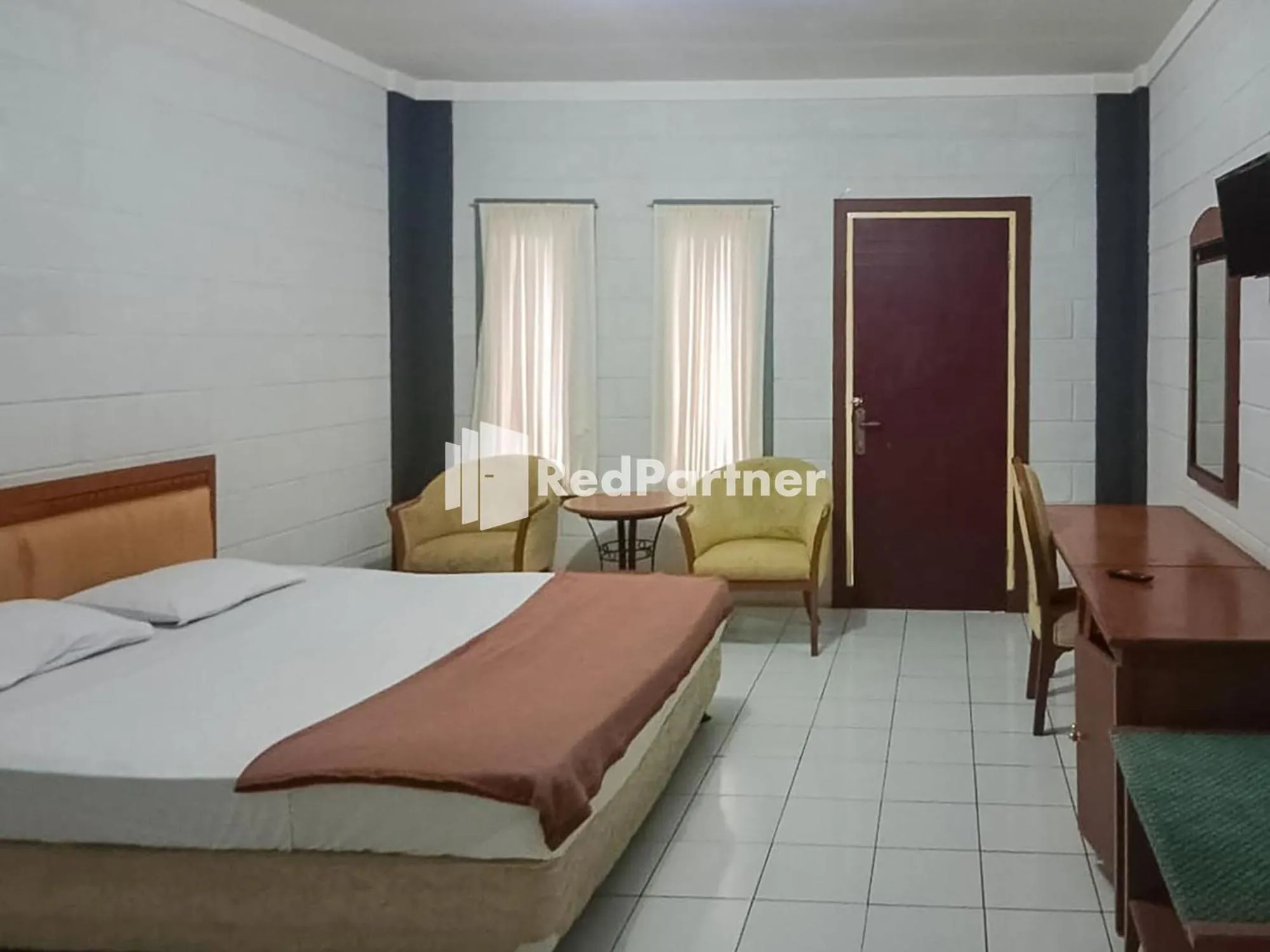 Bed in Kampung Resort Pertiwi RedPartner