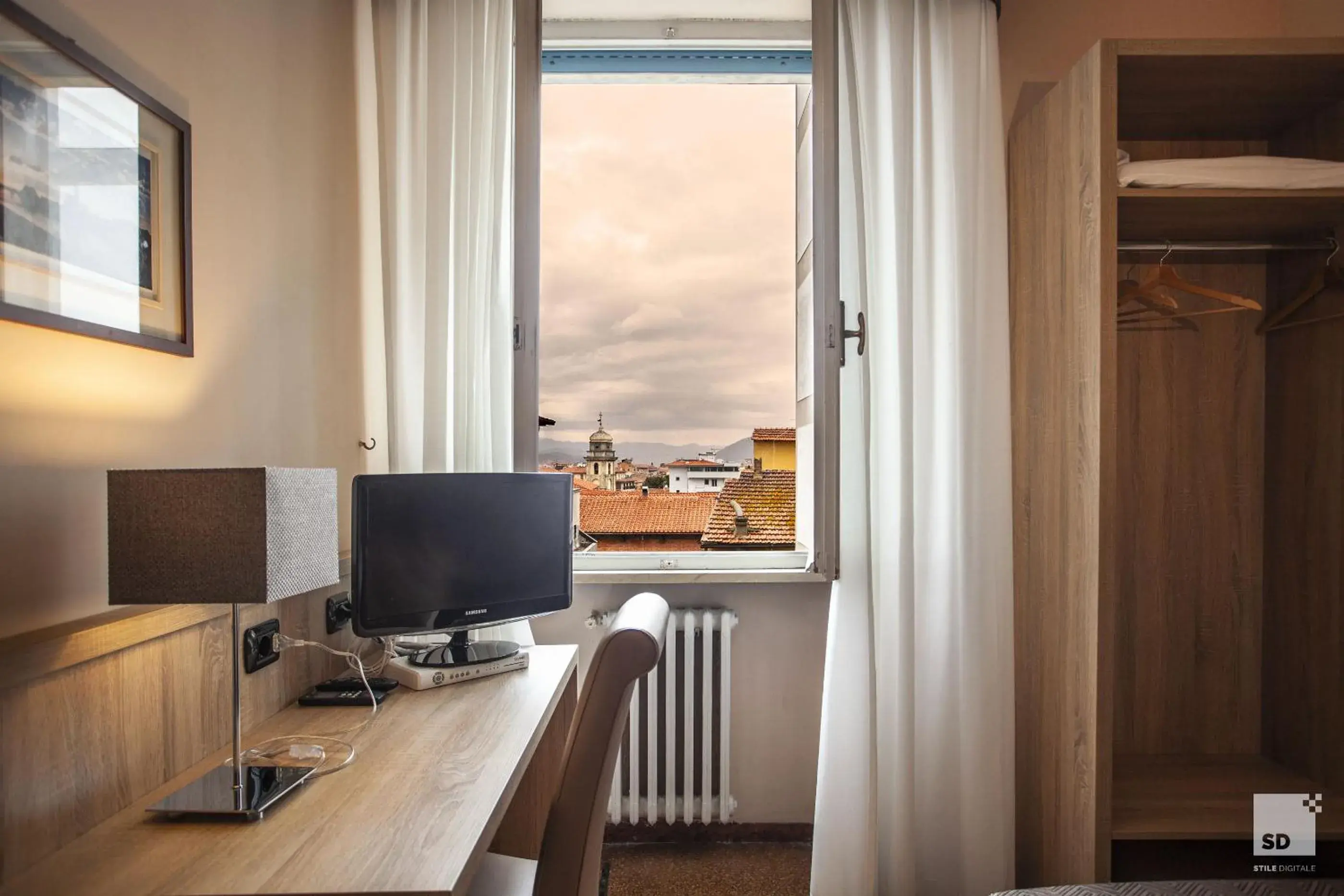 Photo of the whole room in Hotel La Pace Photo of the whole room in Hotel La Pace