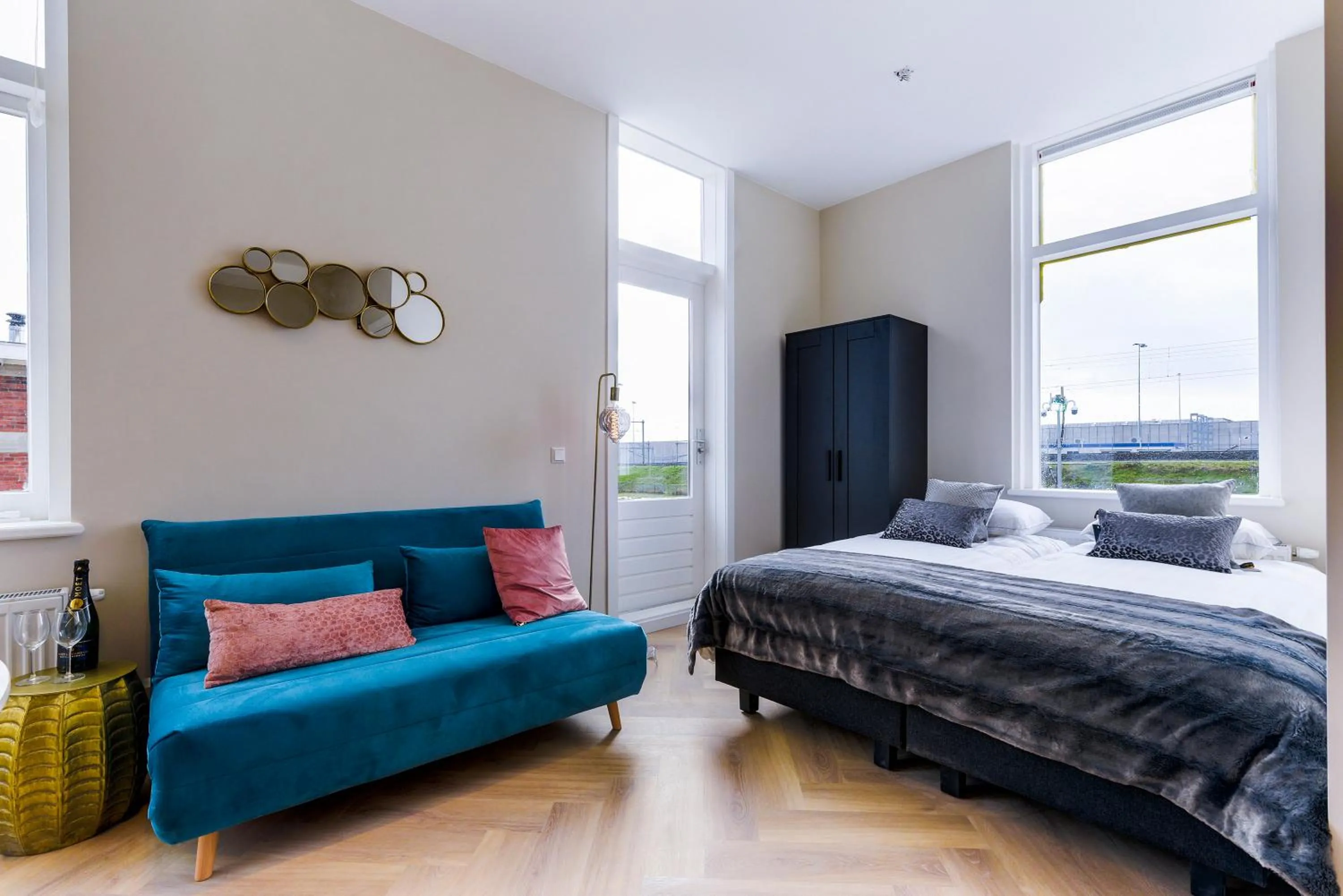 Seating area, Bed in Novallure Short Stay Apartments
