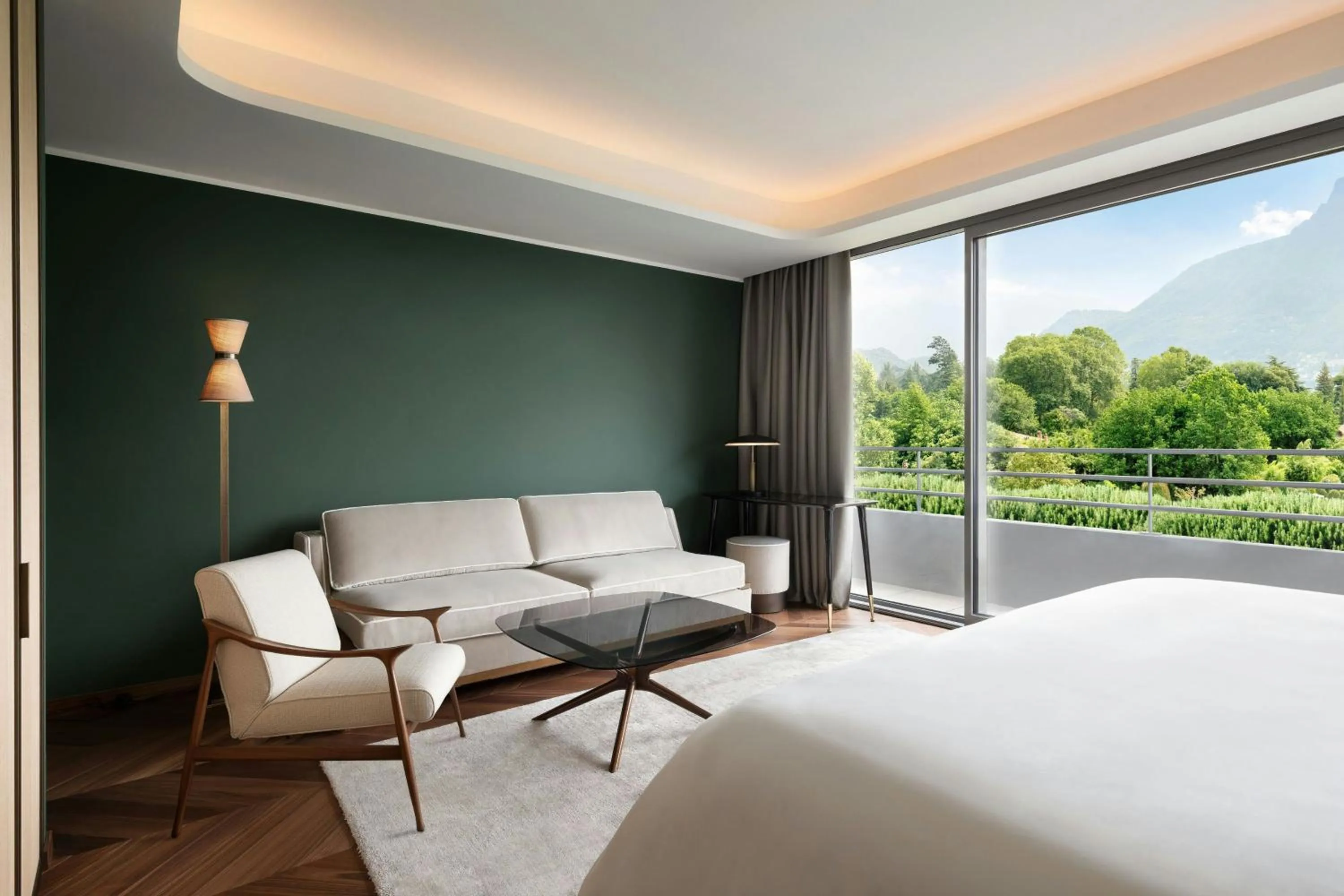 Living room, Bed in Sheraton Lake Como Hotel