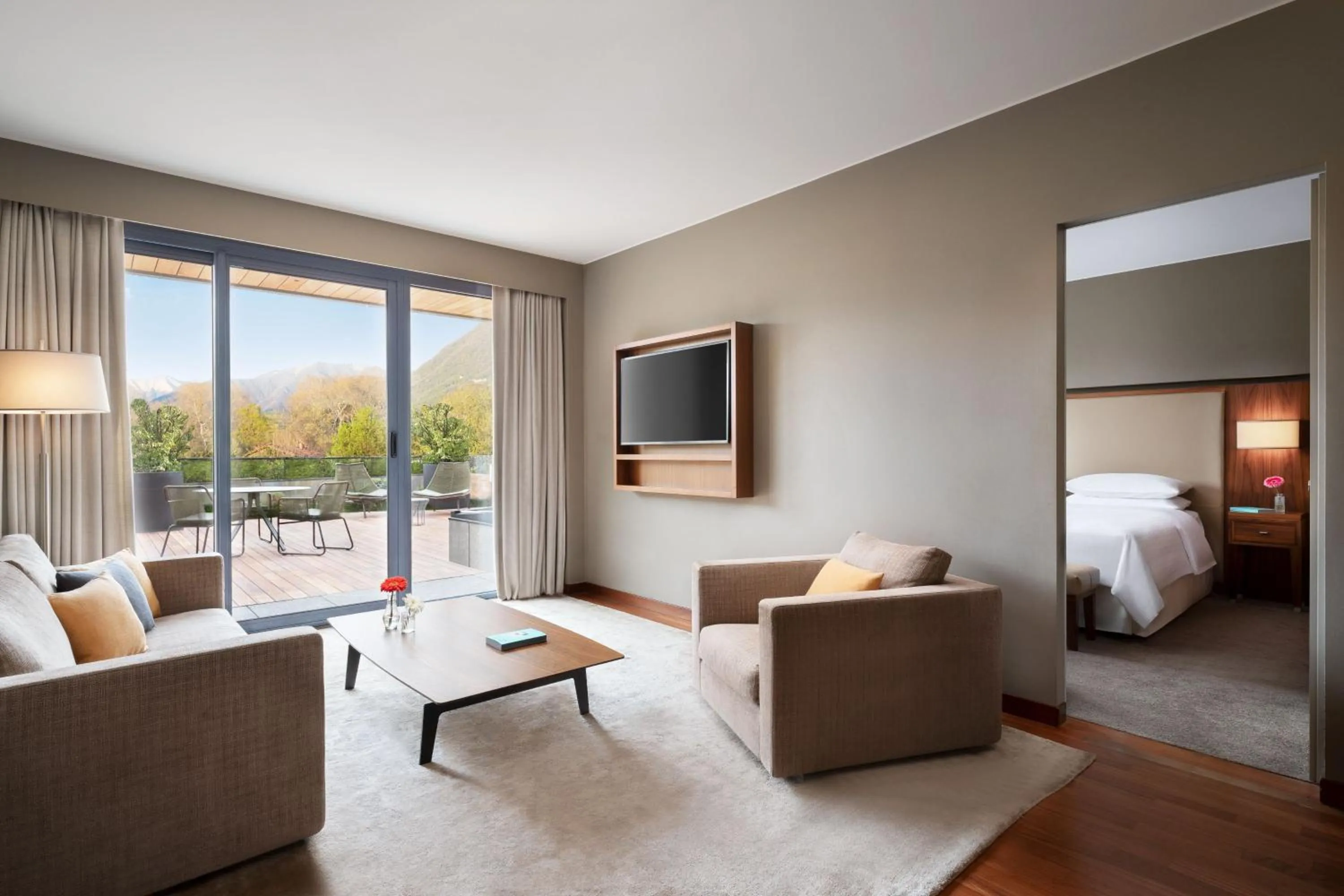 Living room, Bed in Sheraton Lake Como Hotel