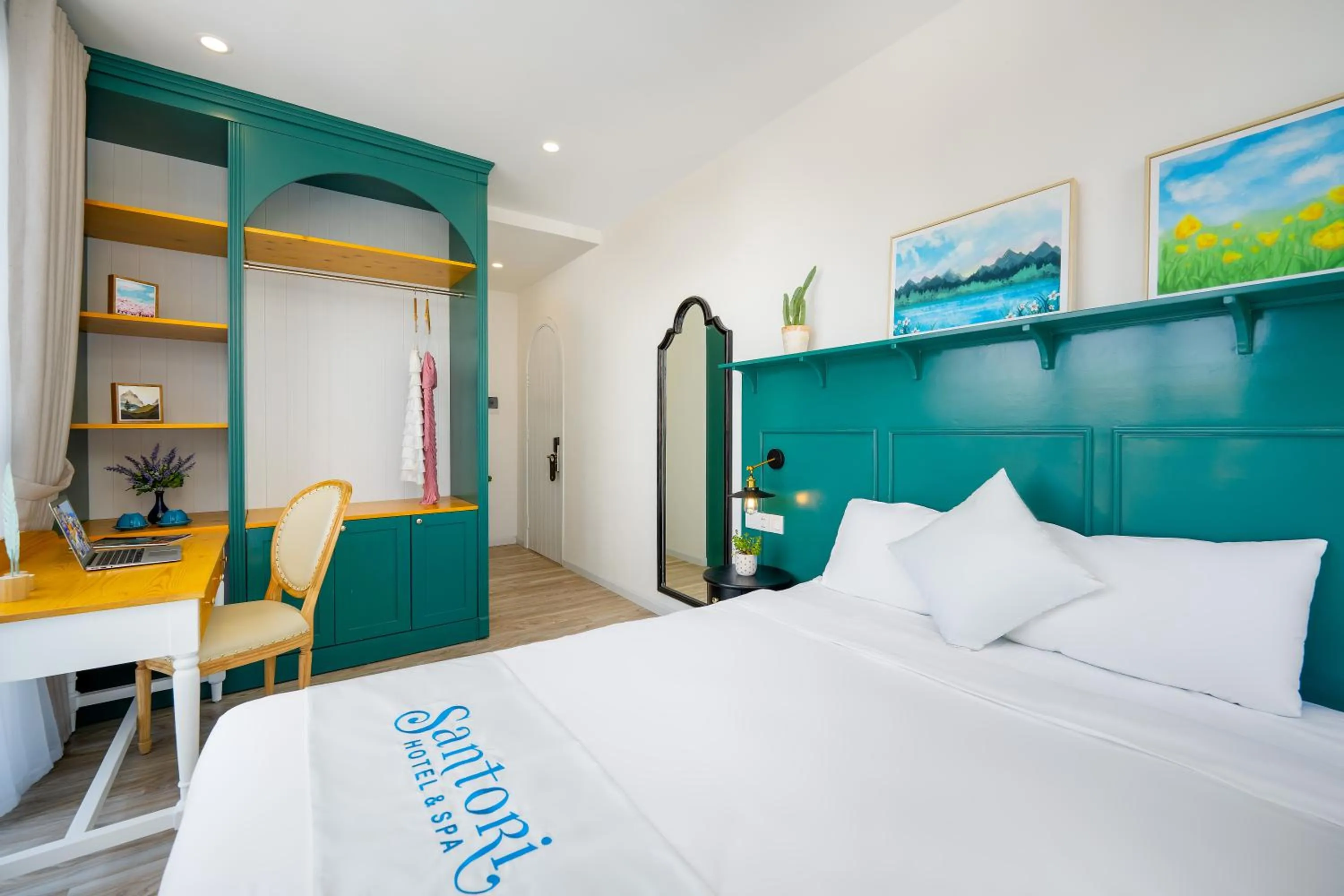 Bed in Santori Hotel And Spa