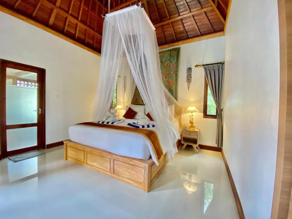 Bed in Sridewi Villas Ubud