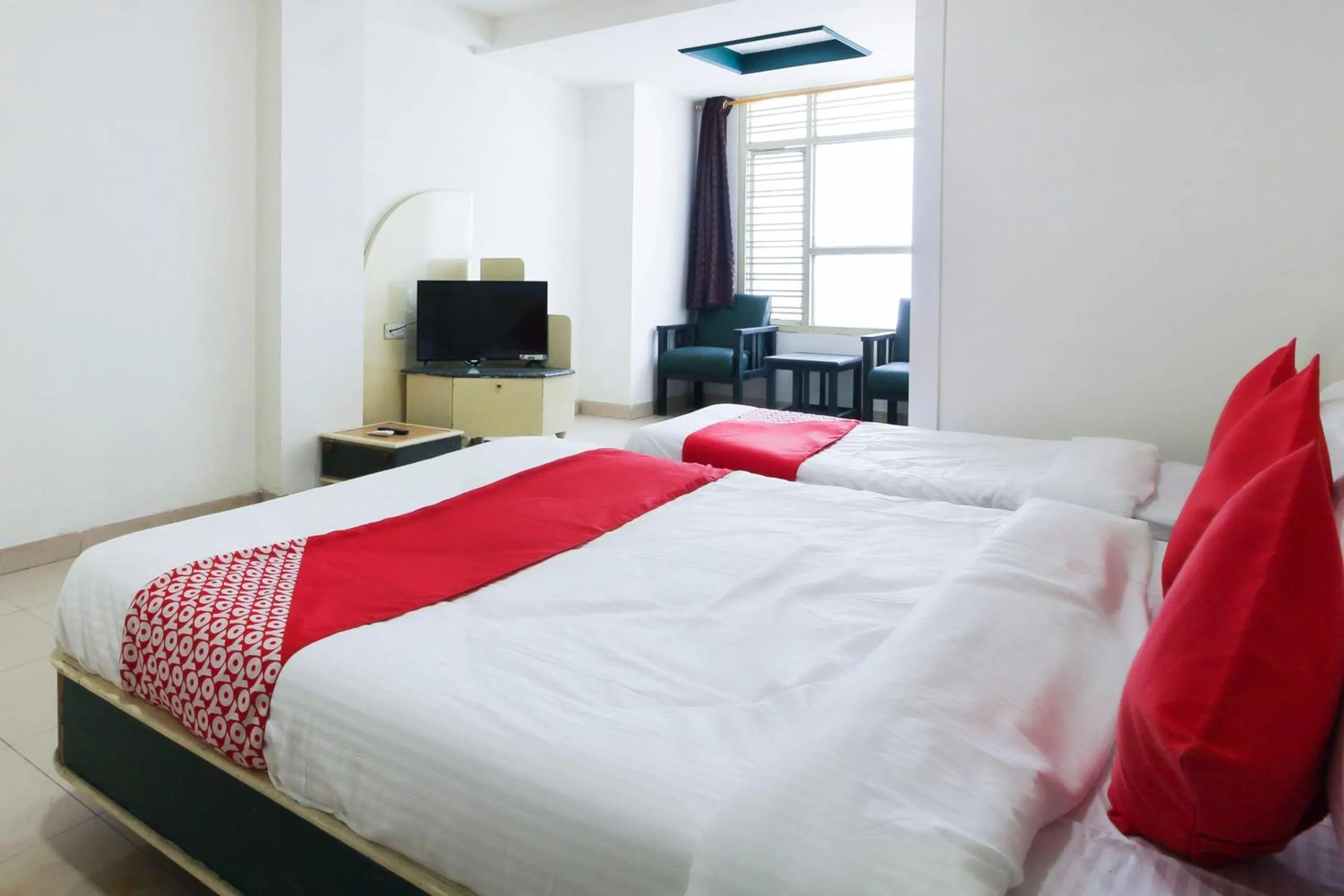 Bedroom, Bed in Hotel O by OYO V Square
