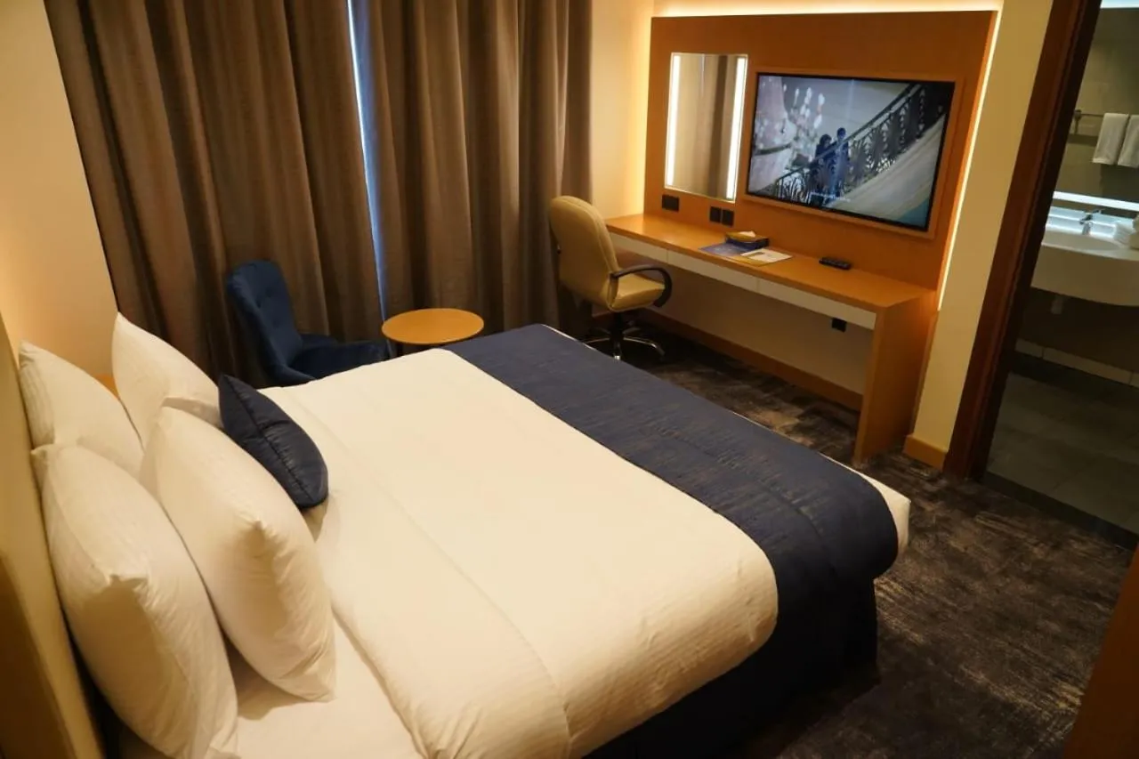 Bed in AL HAYAT HOTEL