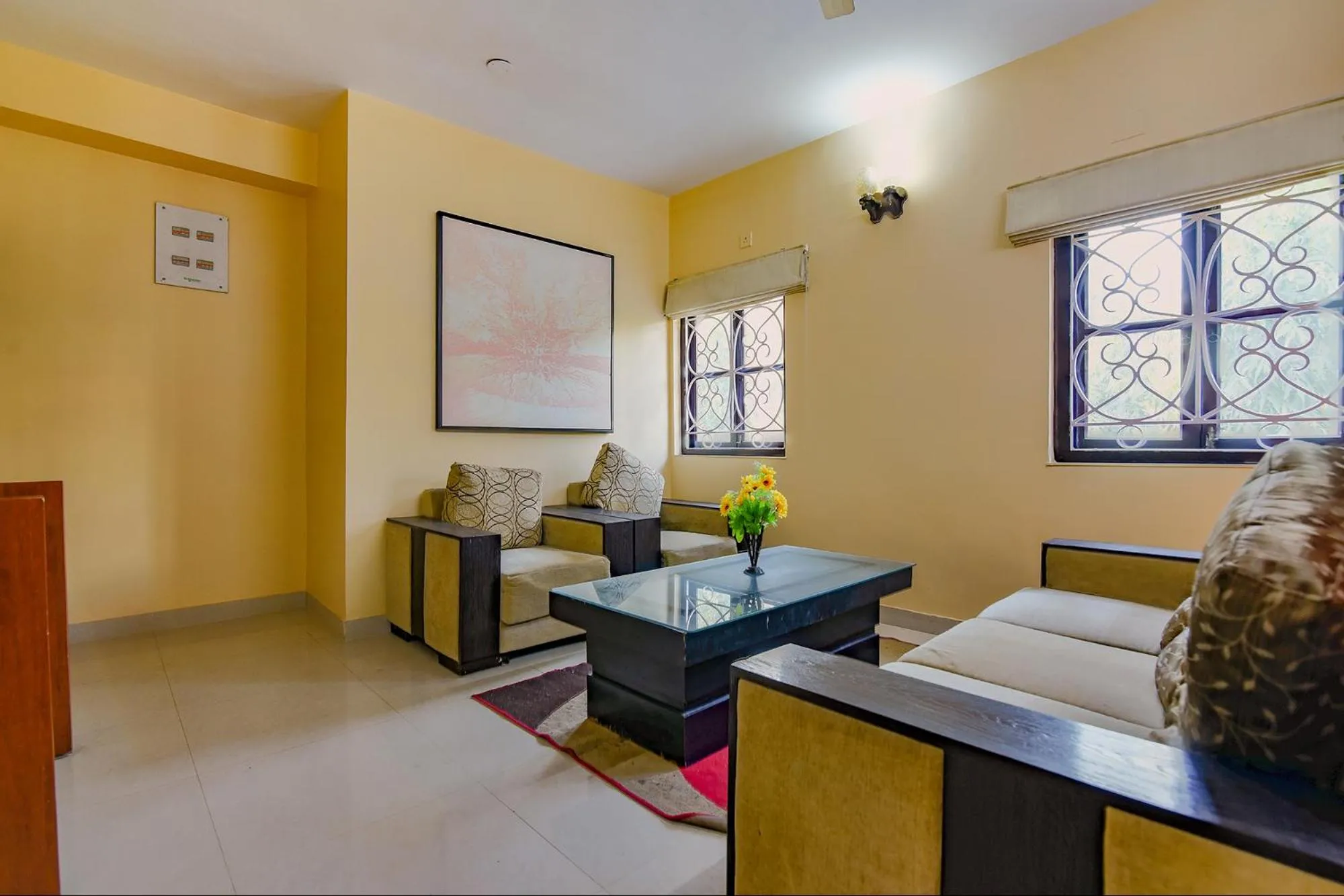 Seating area, Bed in FabHotel New kolkata Residency Inn - Nr Axis Mall