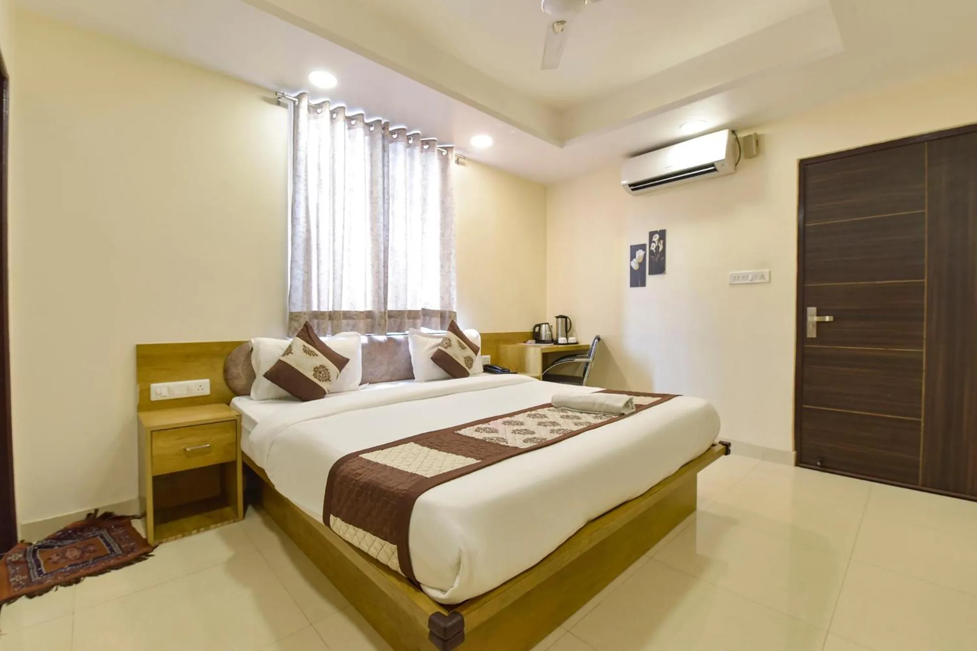 Bed in FabHotel Pink City - World Trade Park