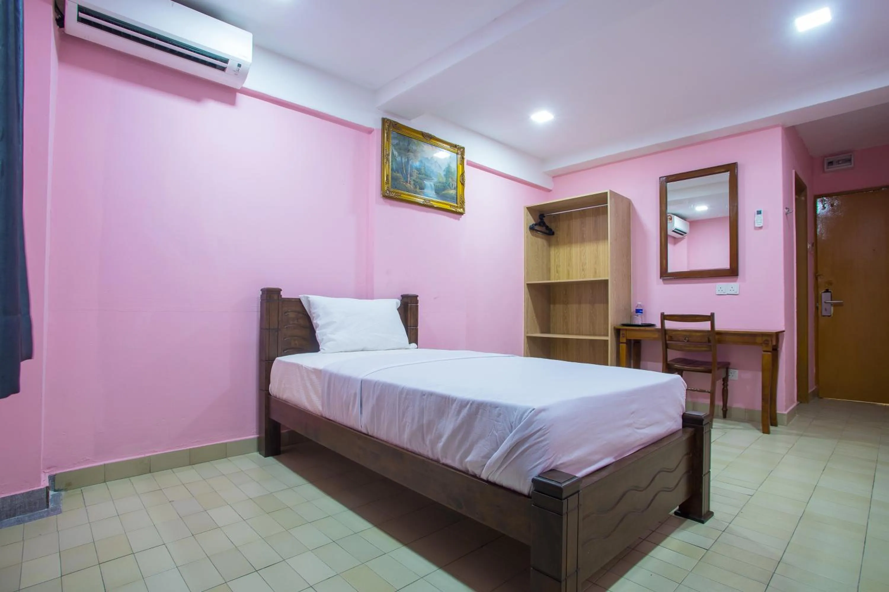 Bed in MK Inn Hotel