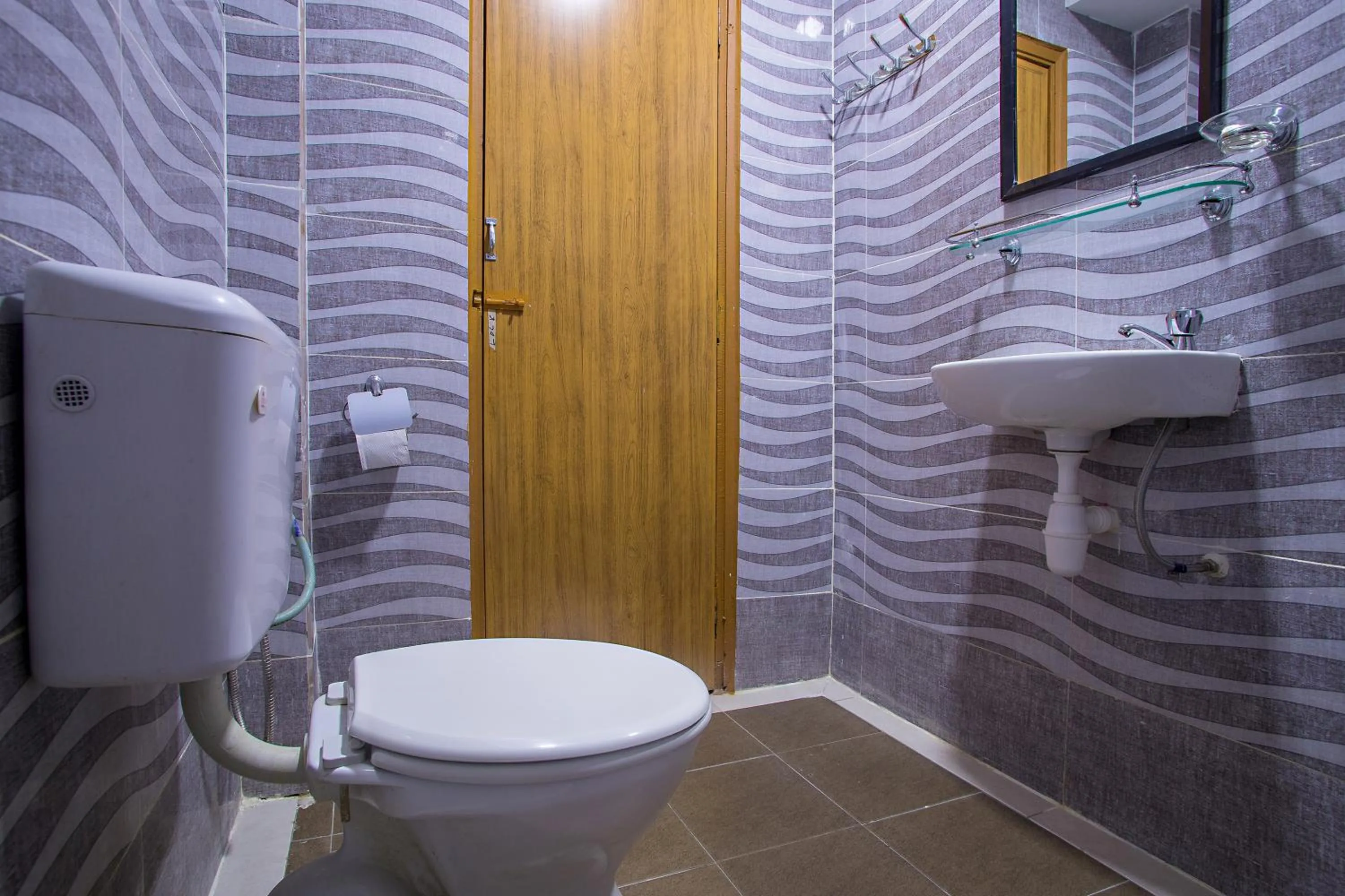 Bathroom in MK Inn Hotel