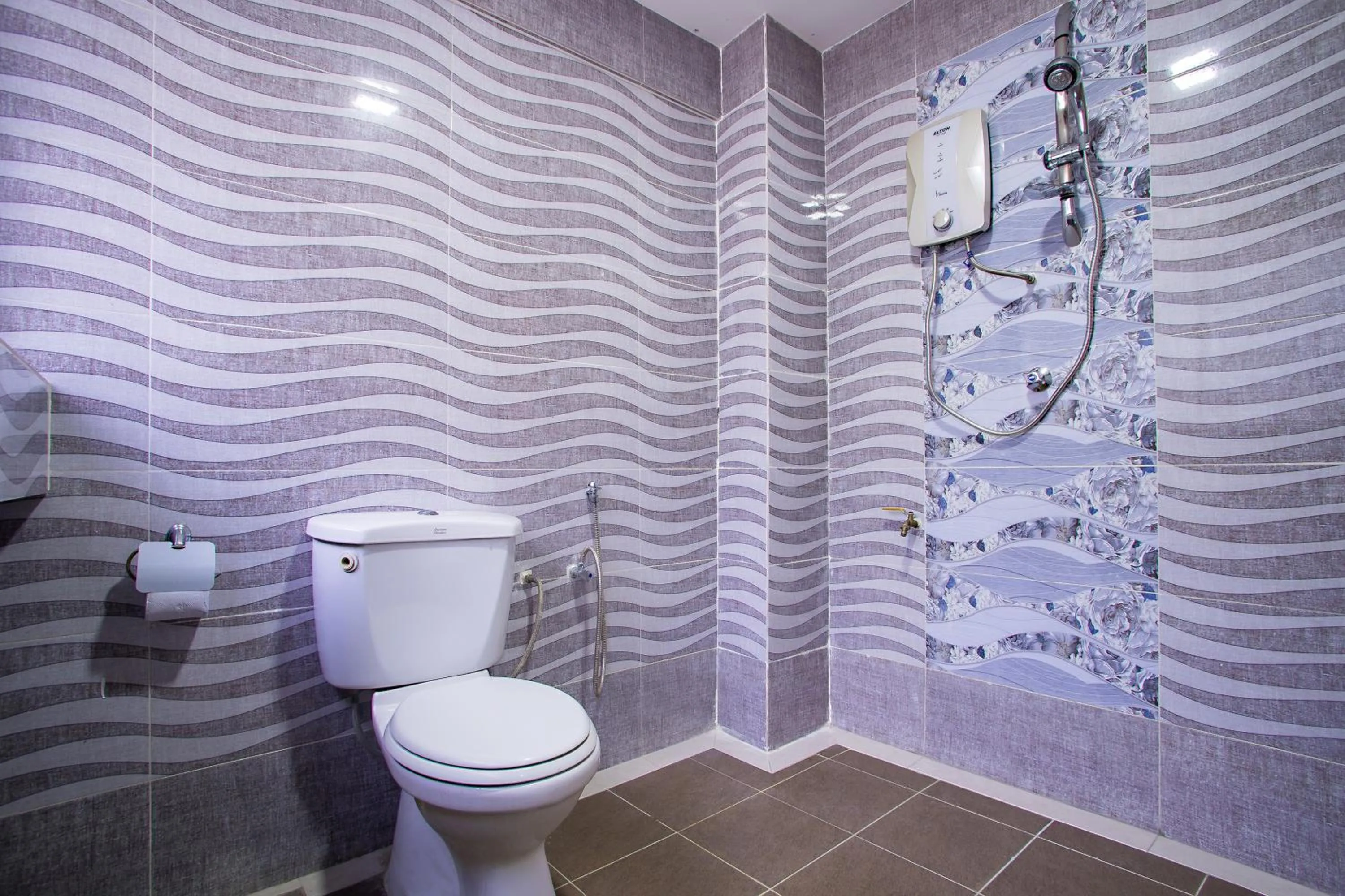 Bathroom in MK Inn Hotel