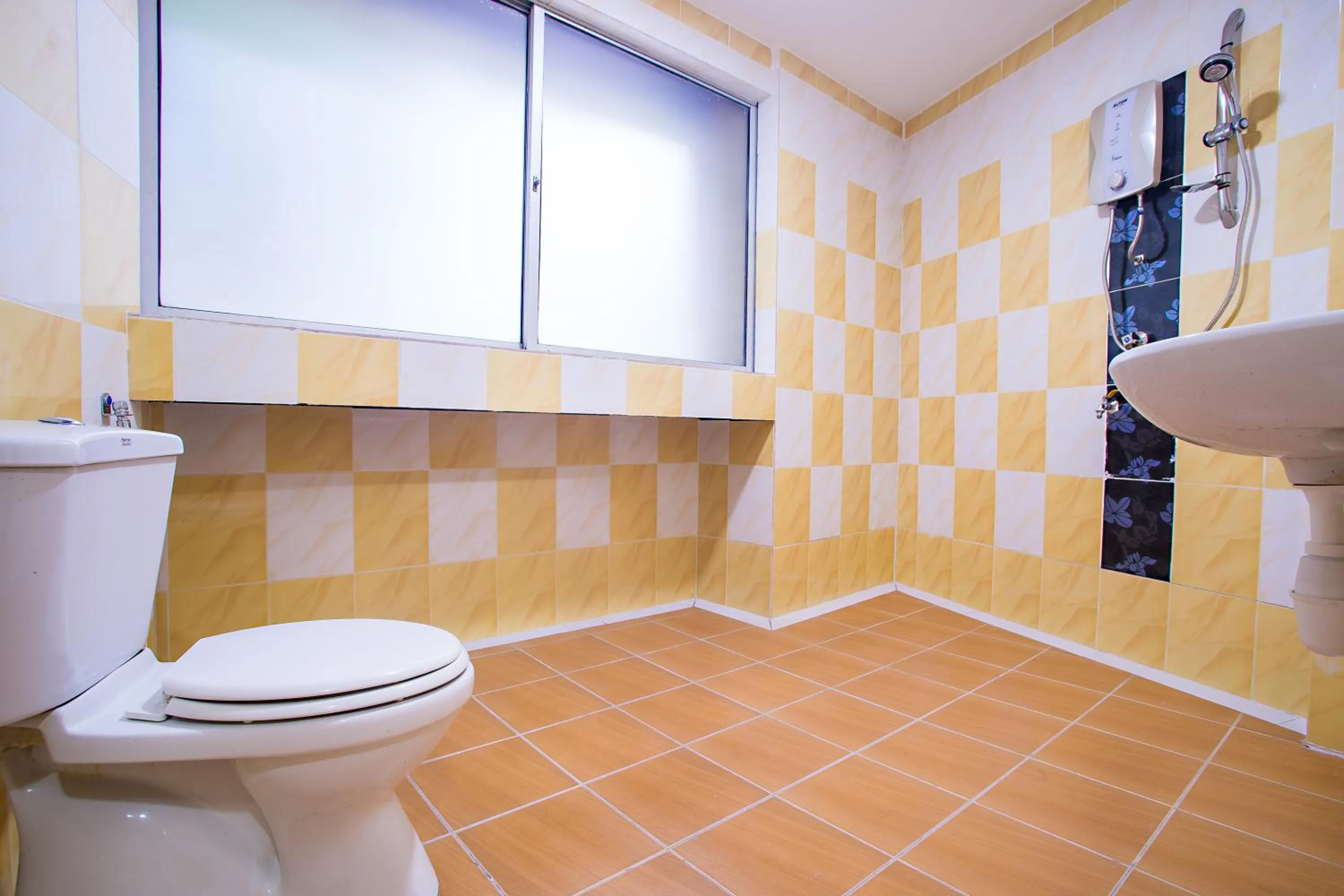 Bathroom in MK Inn Hotel