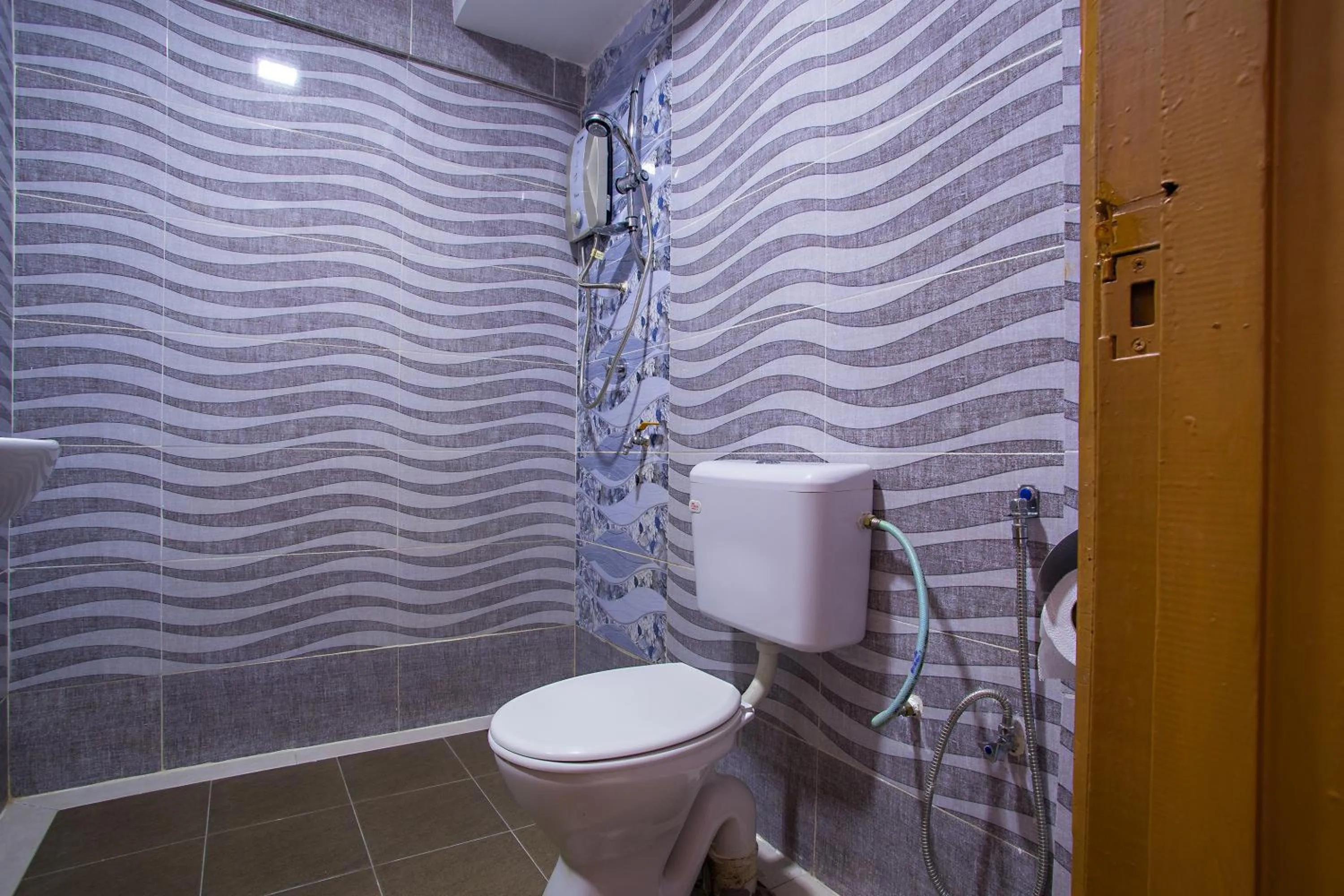 Bathroom in MK Inn Hotel