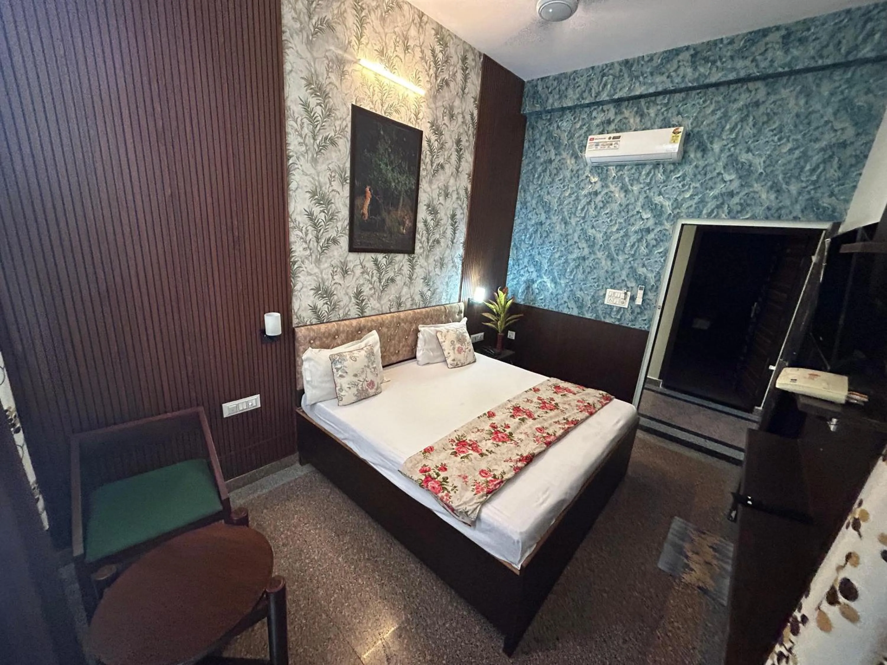 Seating area, Bed in ASHOKA PALACE