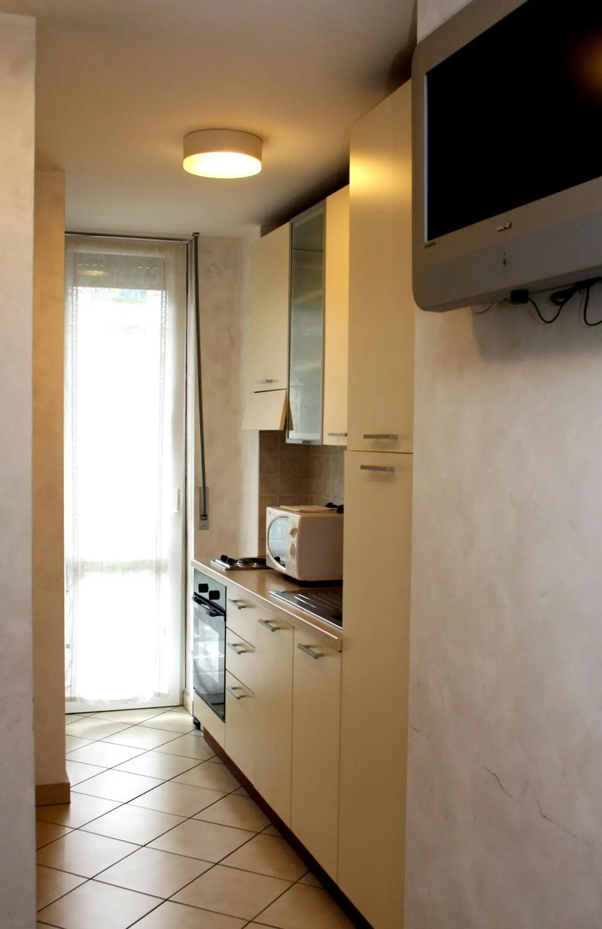 TV and multimedia, Kitchen/Kitchenette in Hotel Engadina