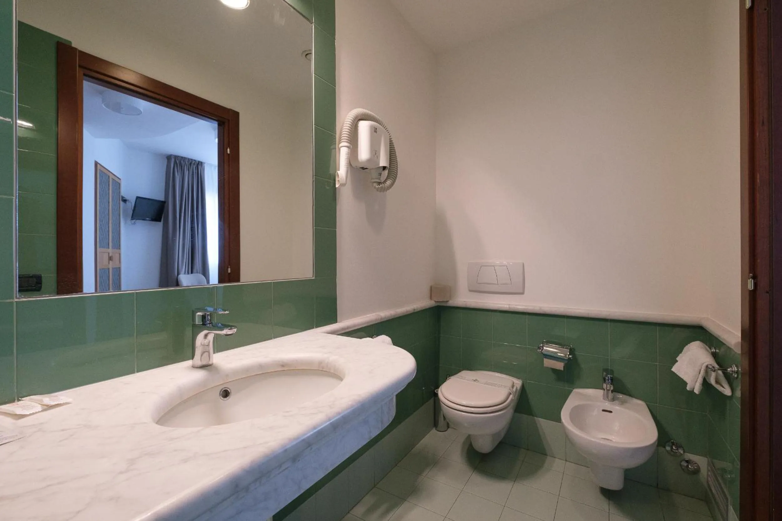 Bathroom in Hotel Portavaldera