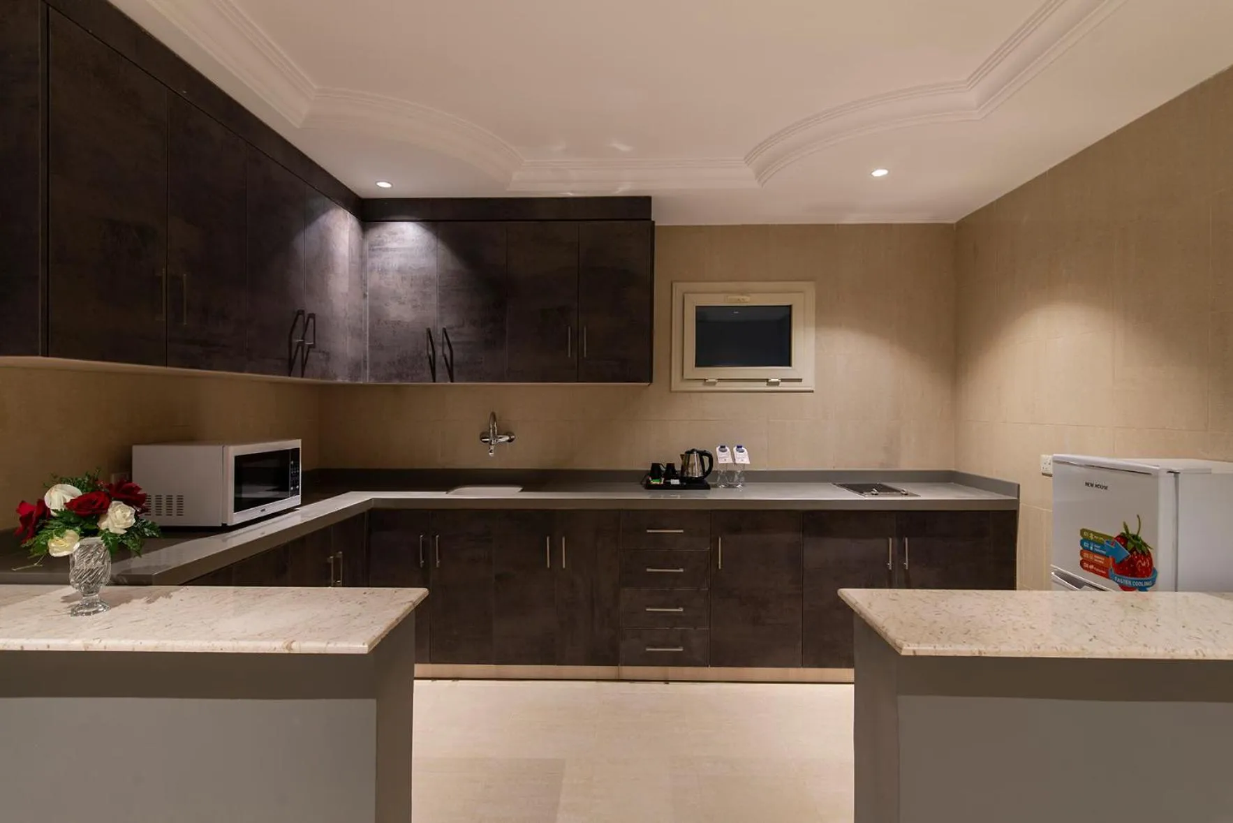 kitchen in Enala Hotel Apartments- Tabuk