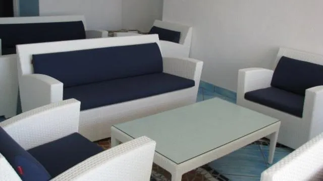 Communal lounge/ TV room in Residence Hotel La Rotonda Sul Mare