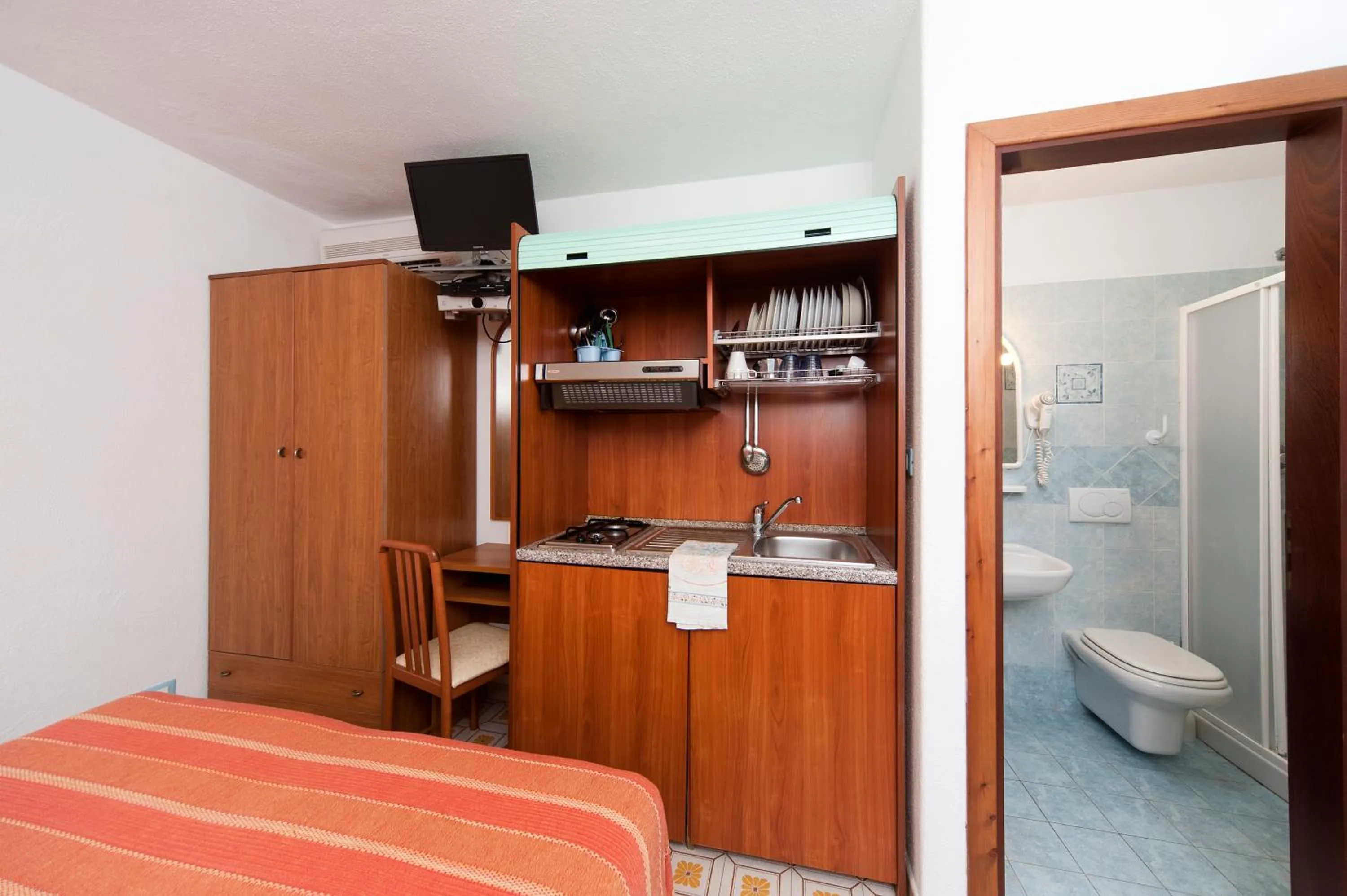 Kitchen or kitchenette, Bed in Residence Hotel La Rotonda Sul Mare