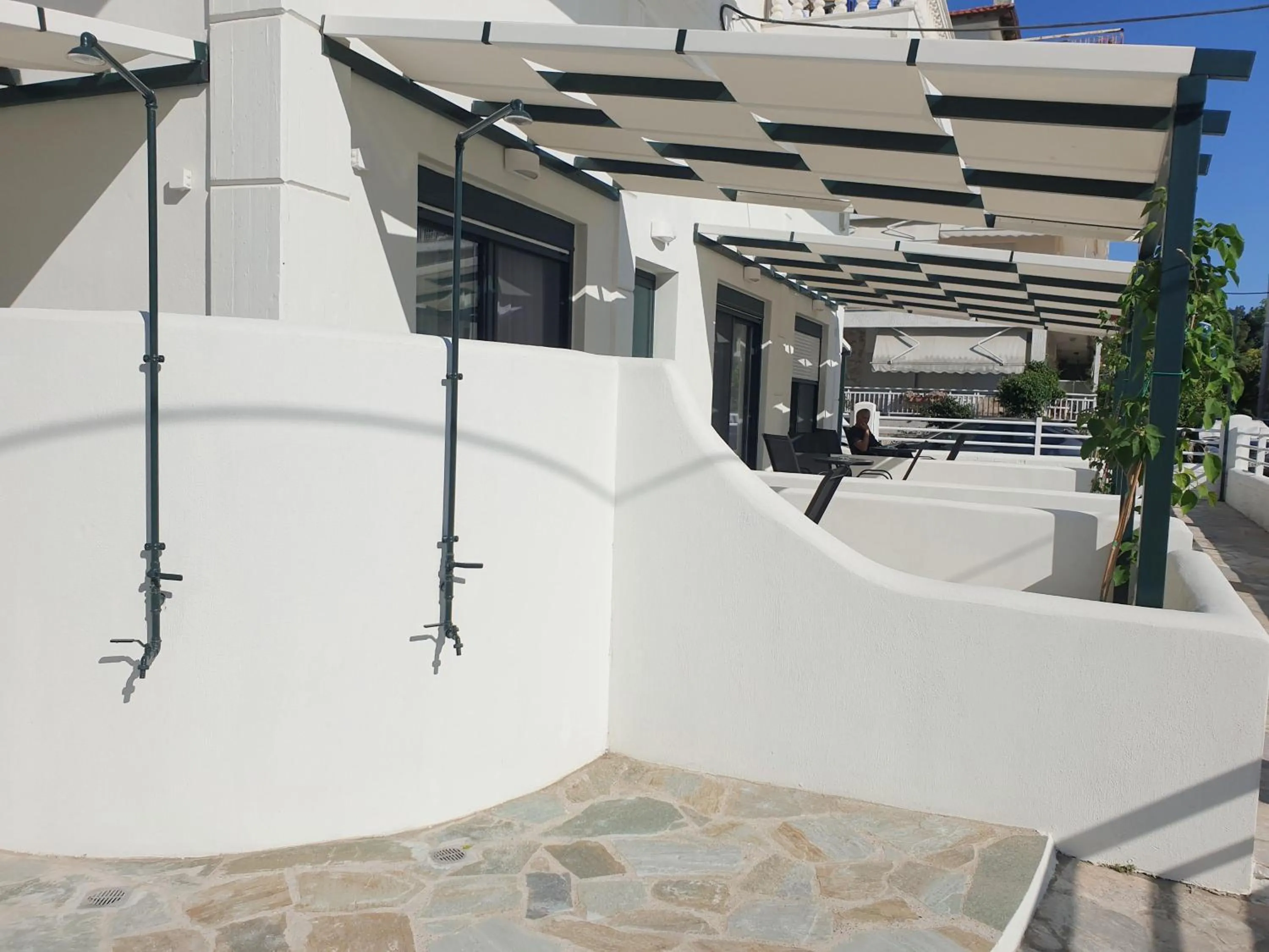 Shower in Eantos Studios and Suites