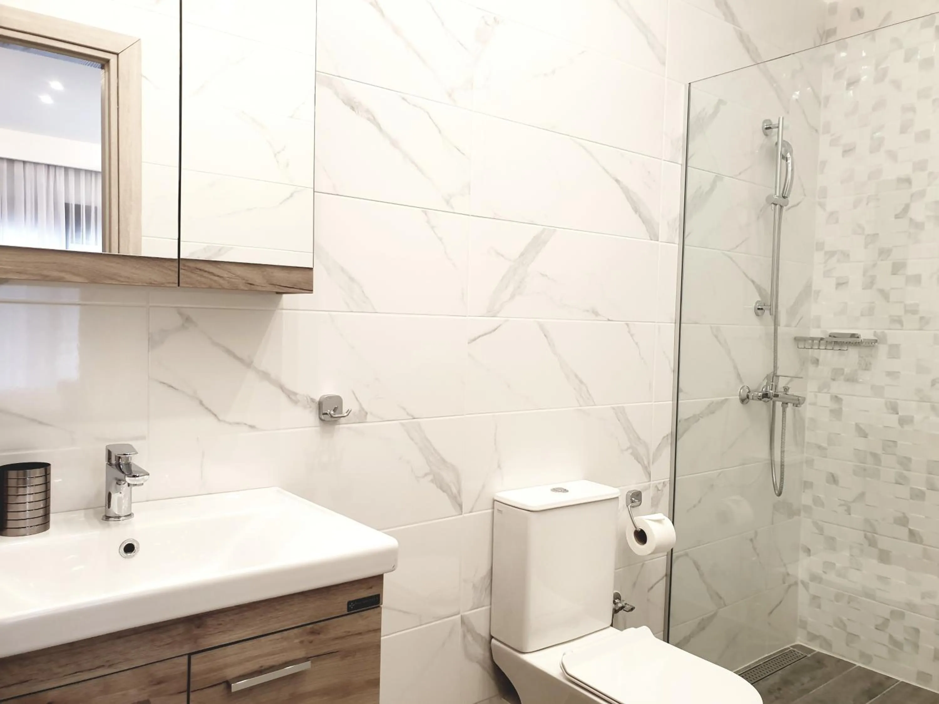 Bathroom in Eantos Studios and Suites