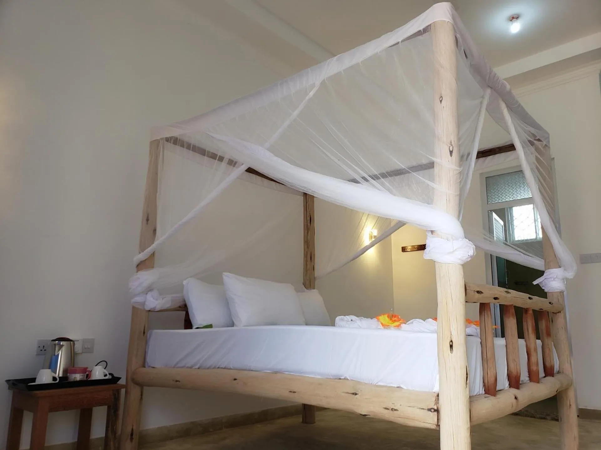 Bed in Serenity Boutique Hotel, Tanzania Unforgettable
