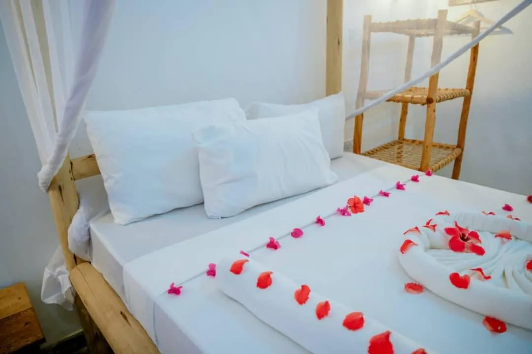 Bed in Serenity Boutique Hotel, Tanzania Unforgettable