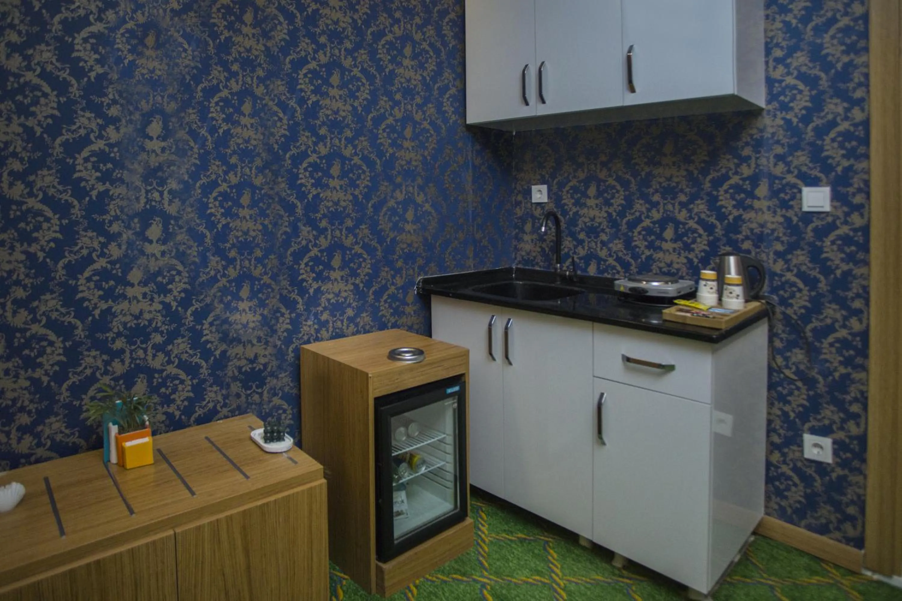 Kitchen or kitchenette in Won Plaza