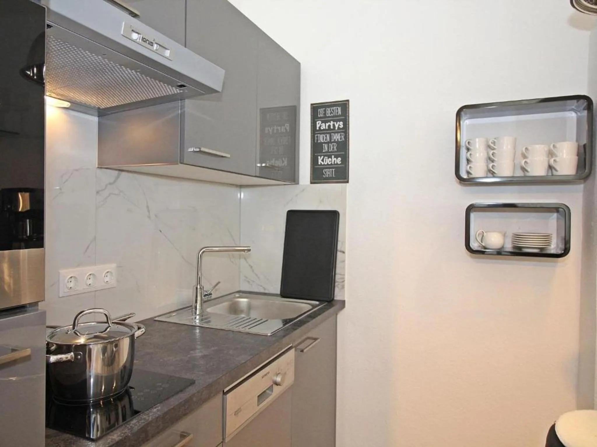 Kitchen or kitchenette in Ferienwohnung Kings