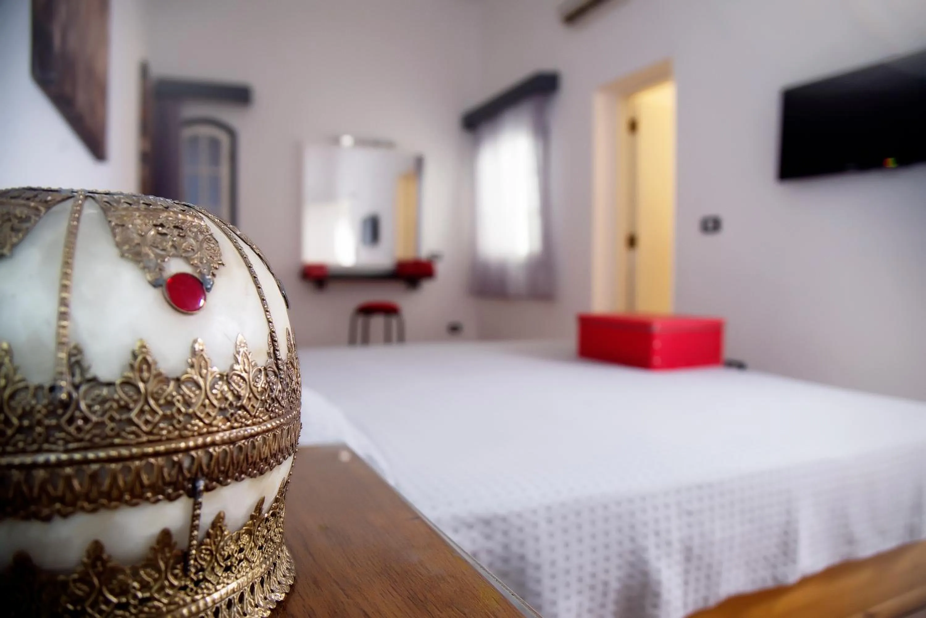 Photo of the whole room, Bed in Sanafir Hotel - El Pacha Suites Sharm - Adults Only