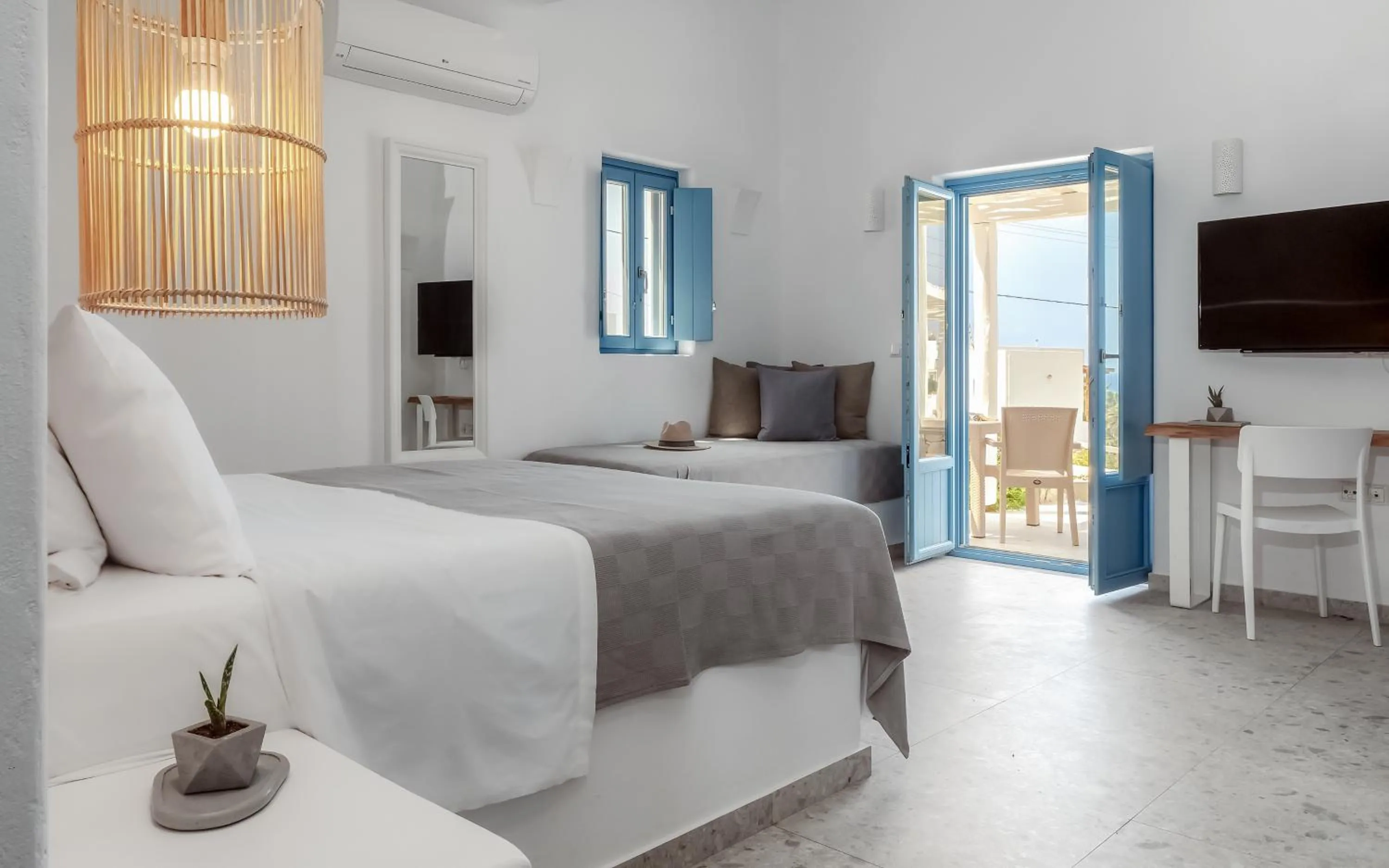 Bed in Camvillia Donoussa Village Suites