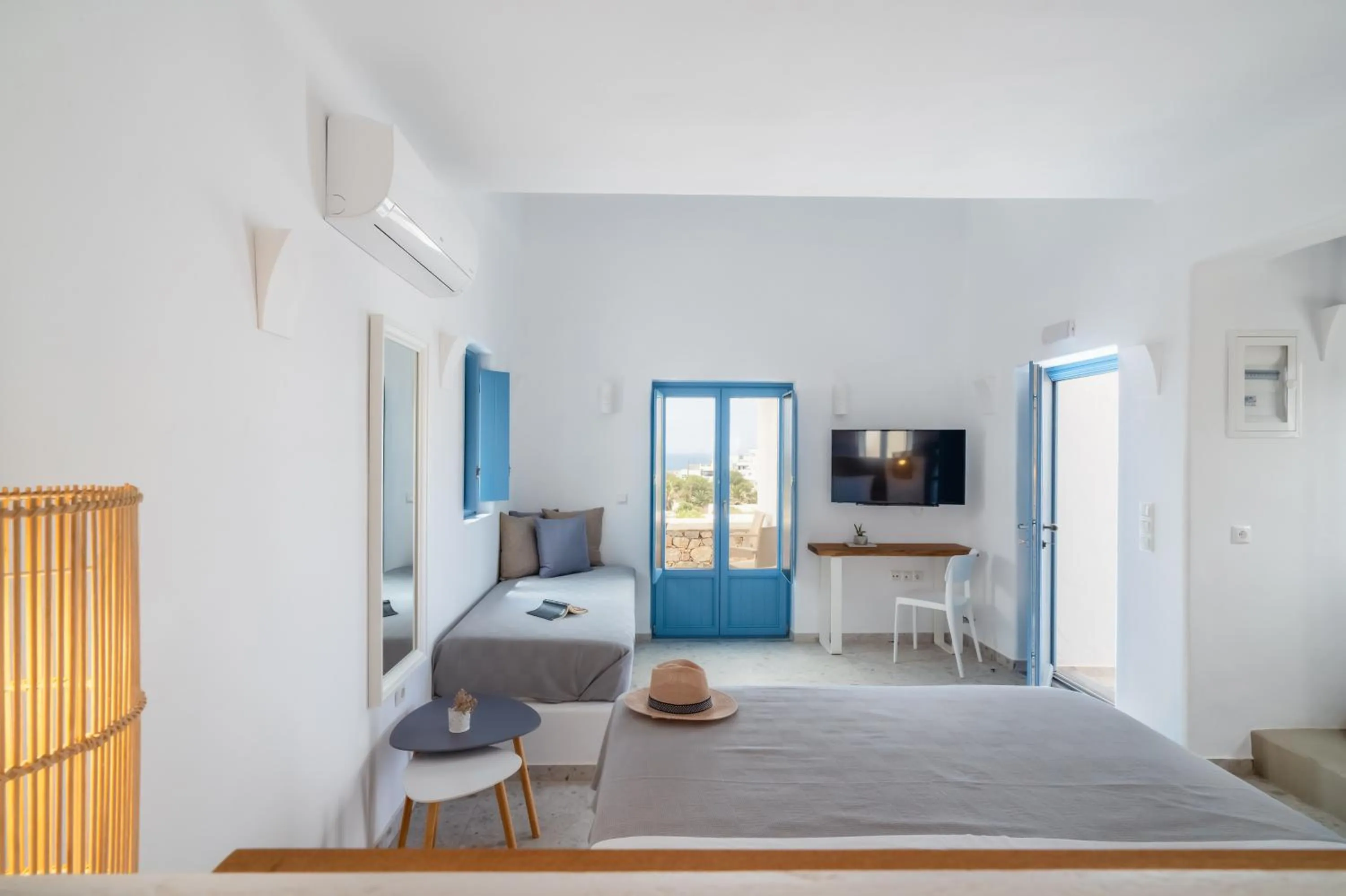 Bed in Camvillia Donoussa Village Suites