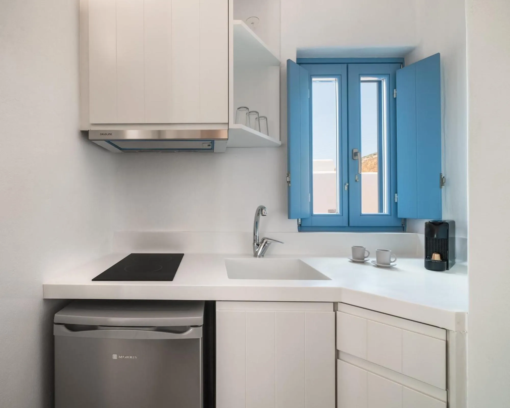 Kitchen or kitchenette in Camvillia Donoussa Village Suites
