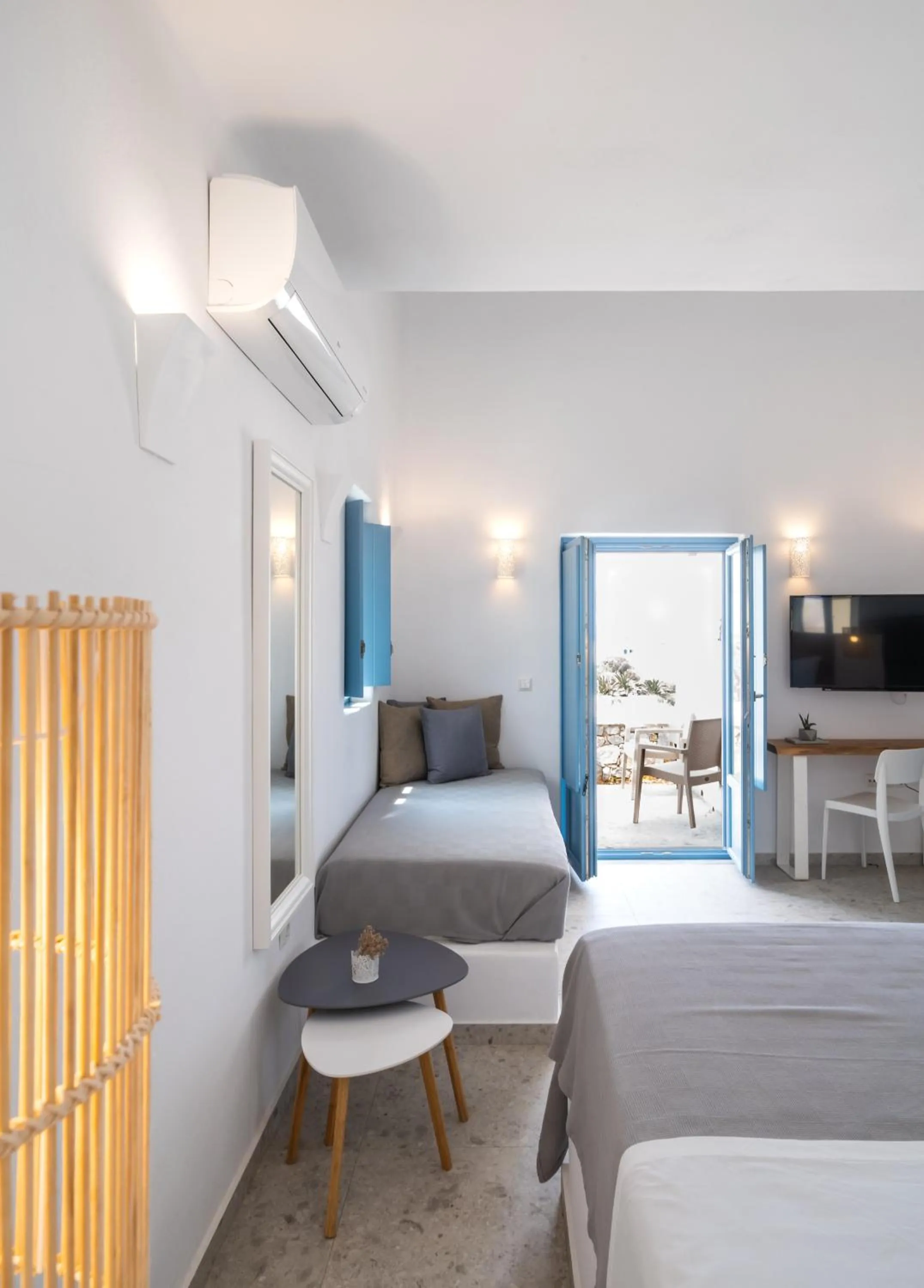 Seating area, Bed in Camvillia Donoussa Village Suites