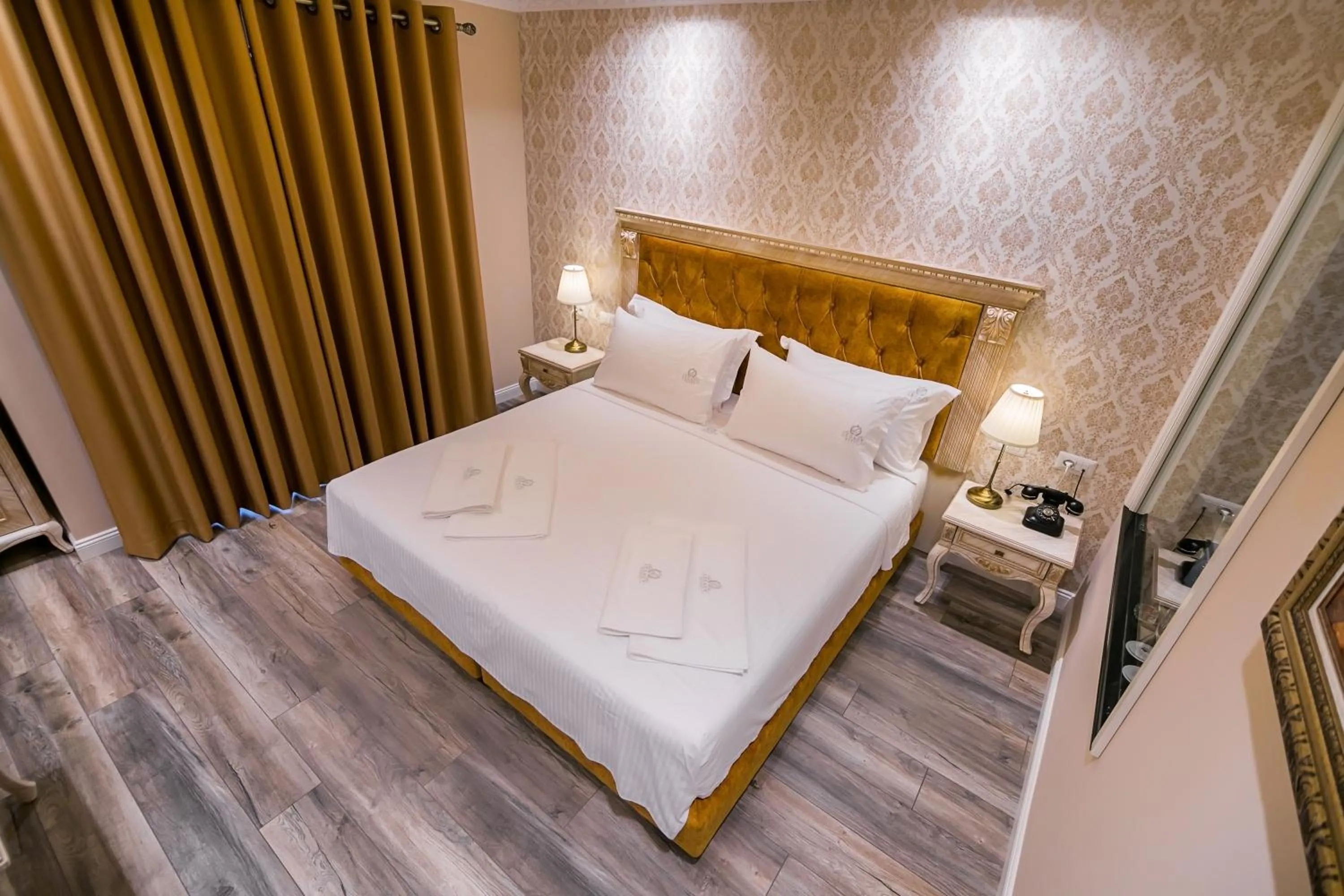 Bed in Legacy Boutique Hotel