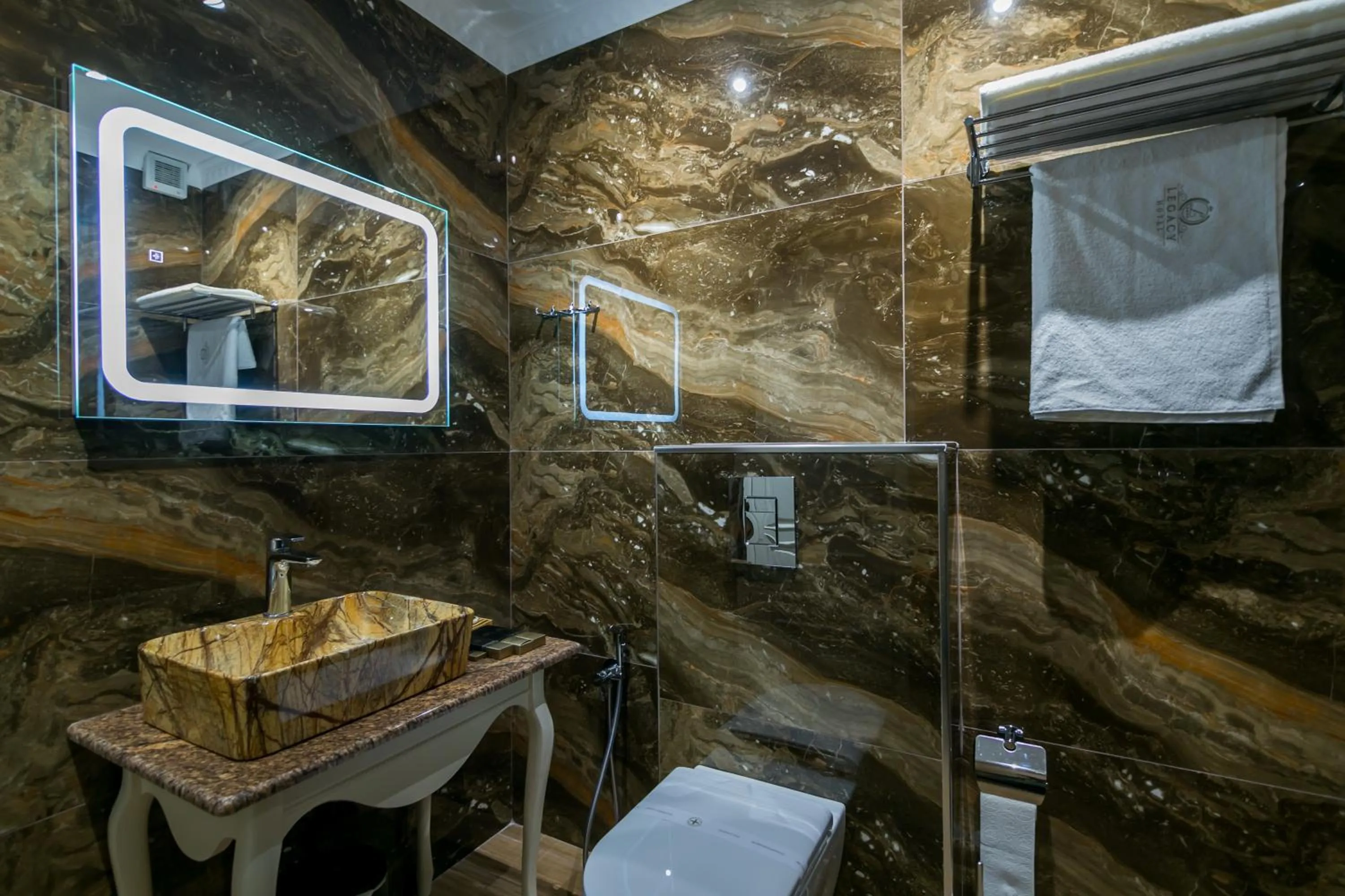 Toilet in Legacy Boutique Hotel