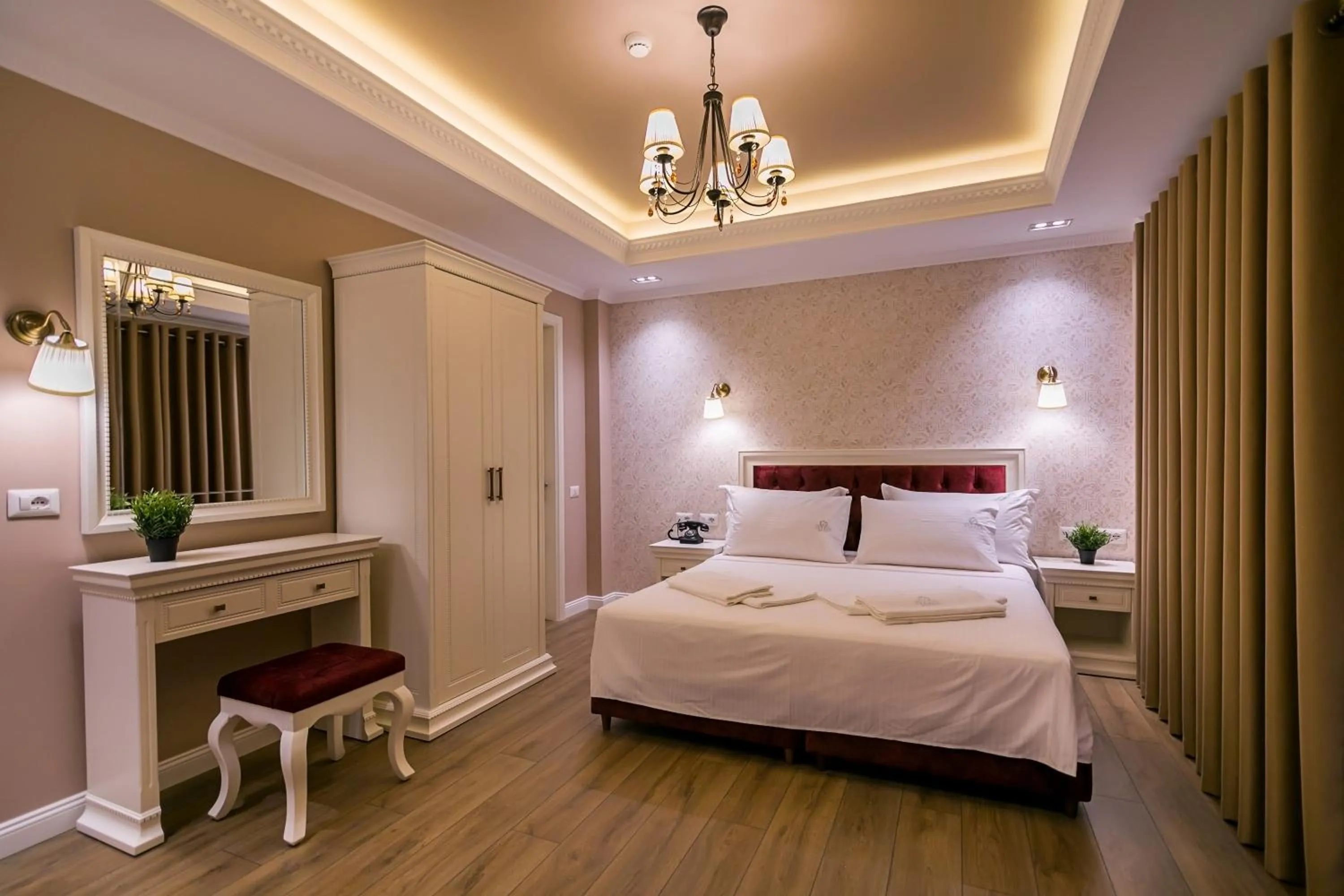 Bed in Legacy Boutique Hotel