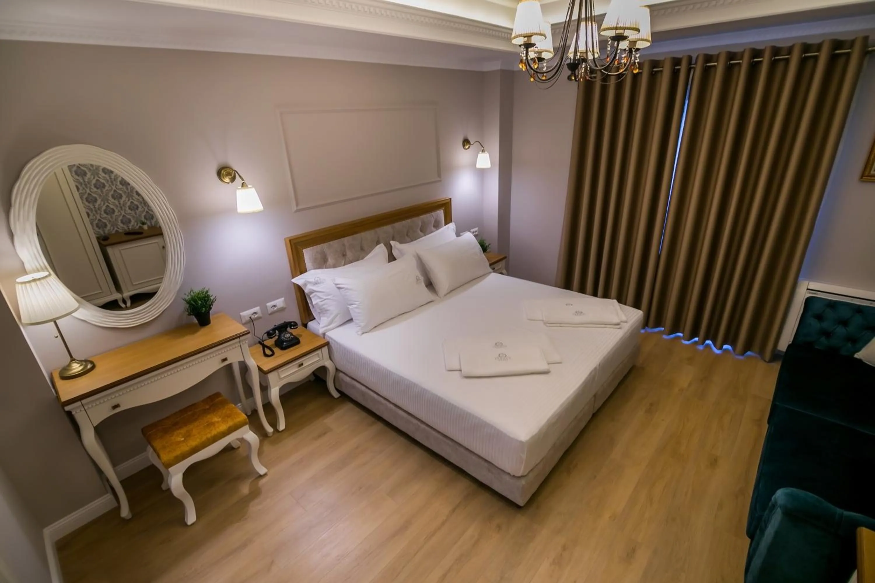 Bed in Legacy Boutique Hotel