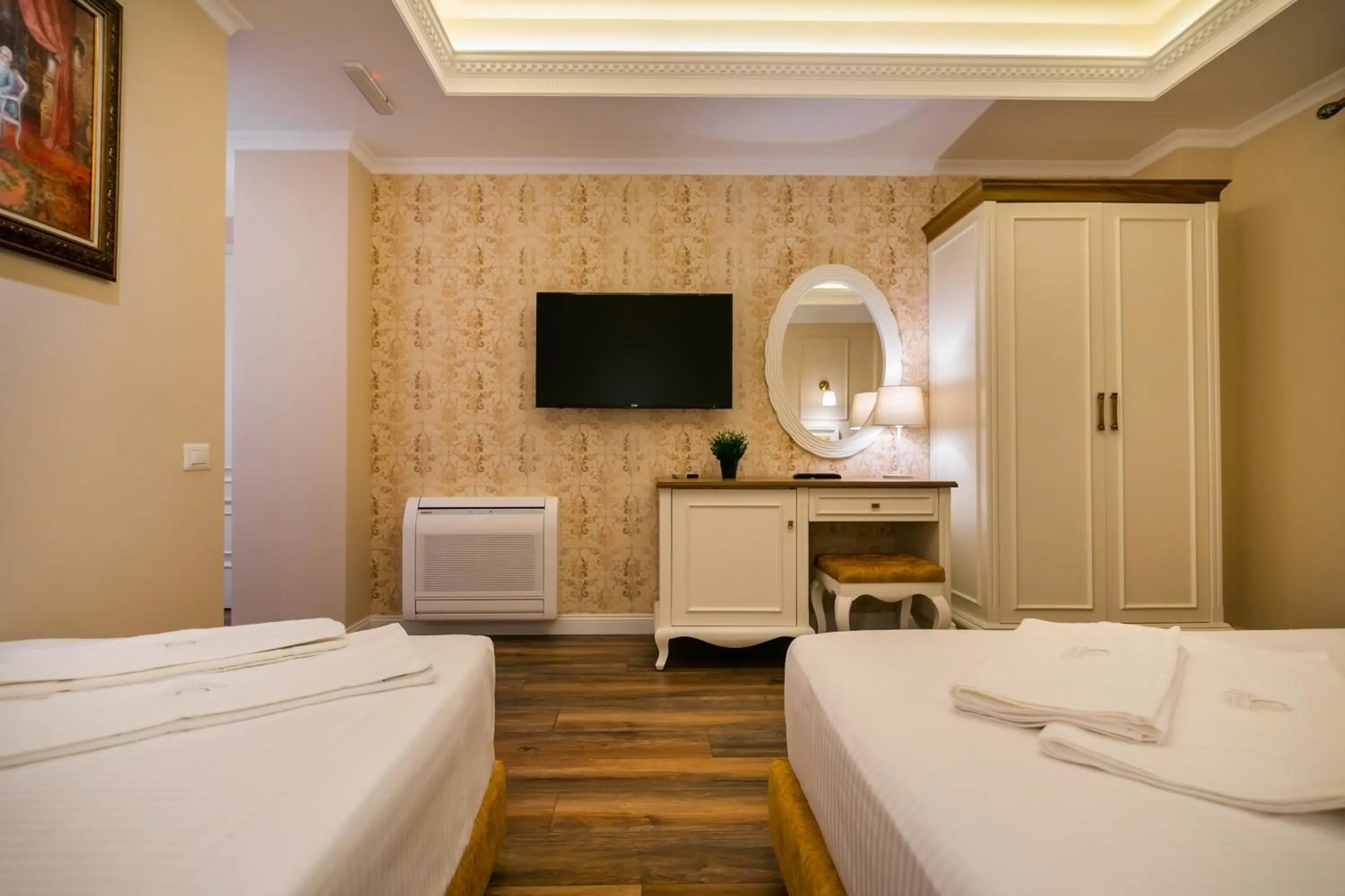 Bed in Legacy Boutique Hotel