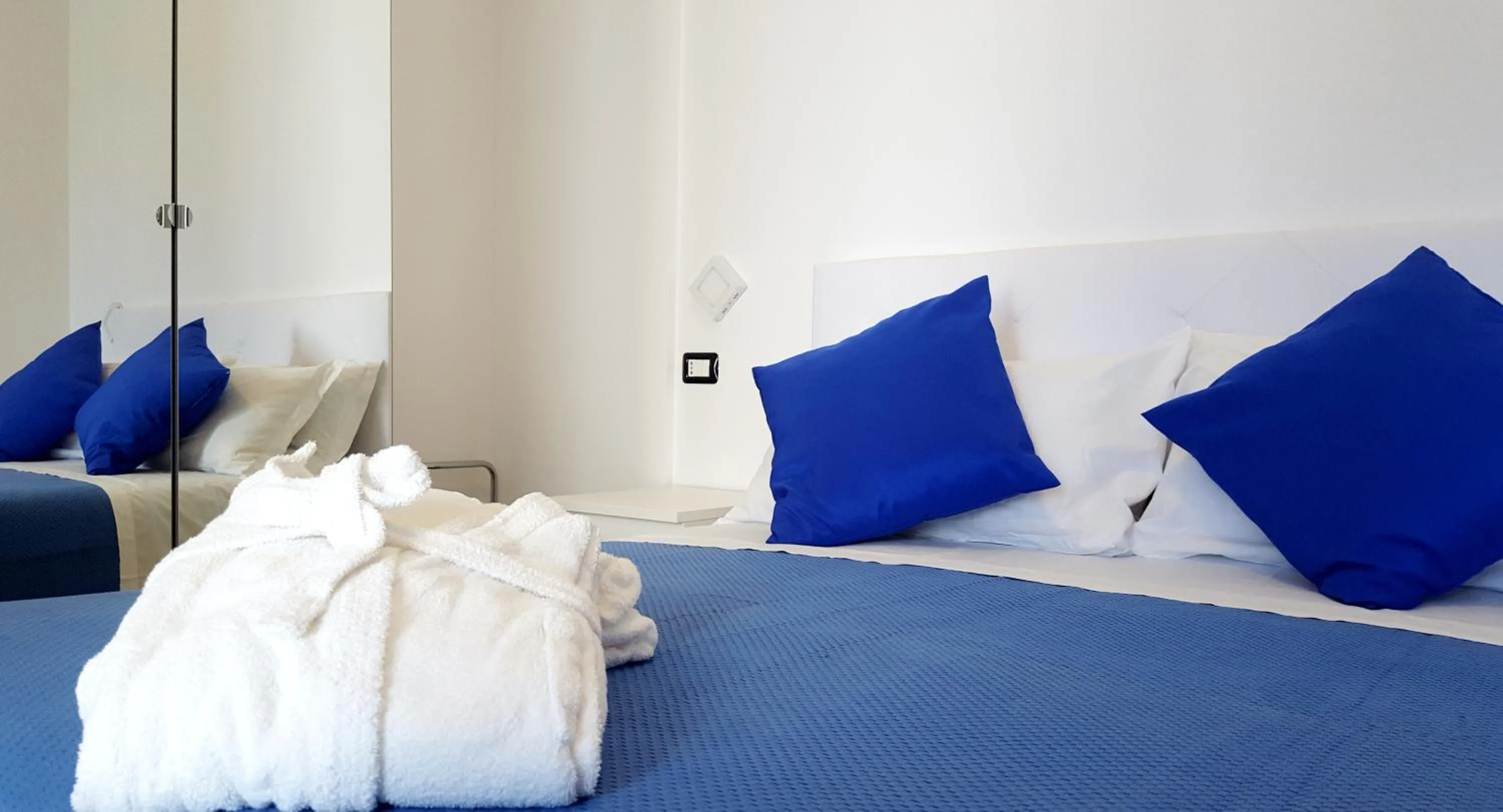 Bed in Hotel Mare Blu -- boutique