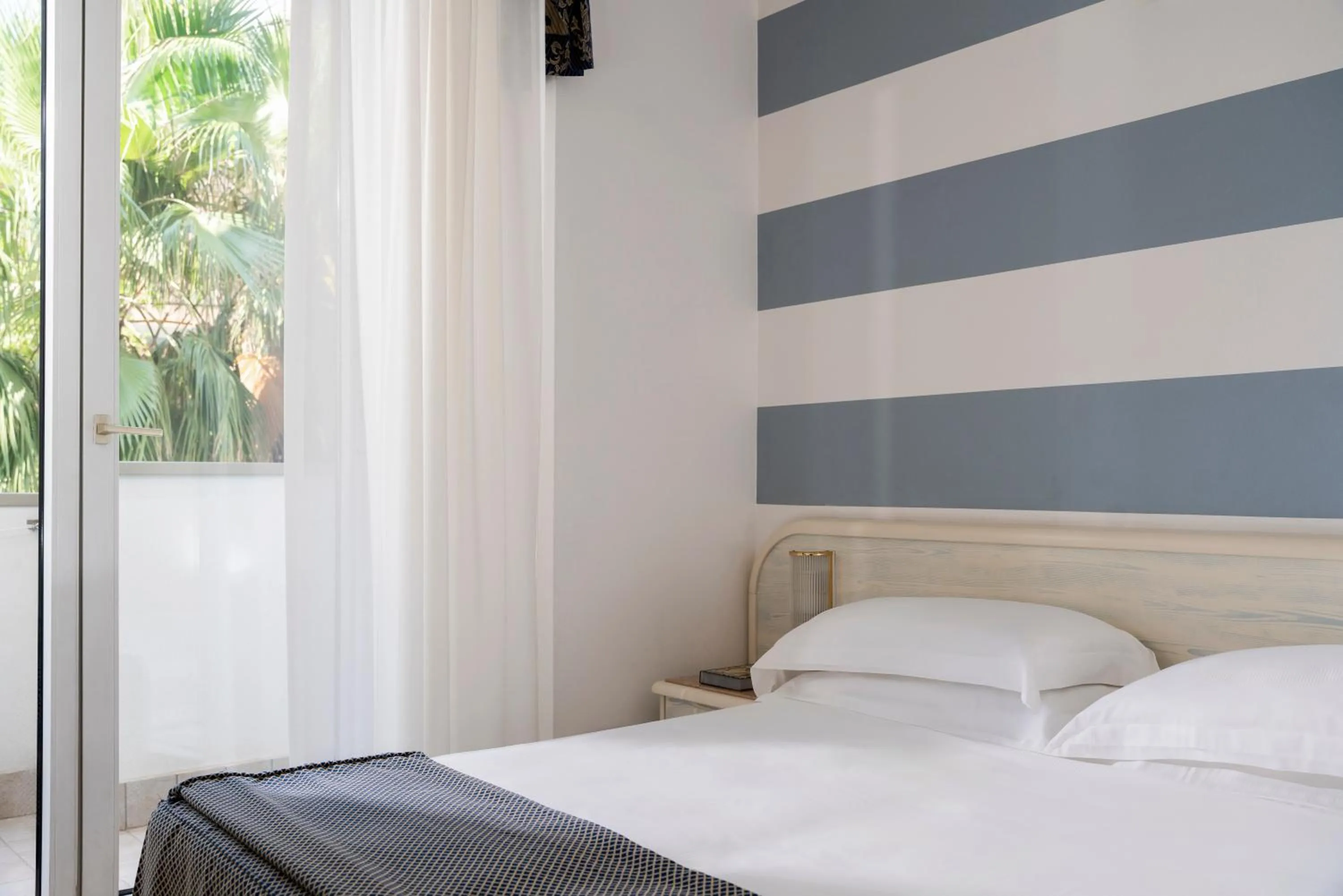 Bed in Hotel Du Soleil