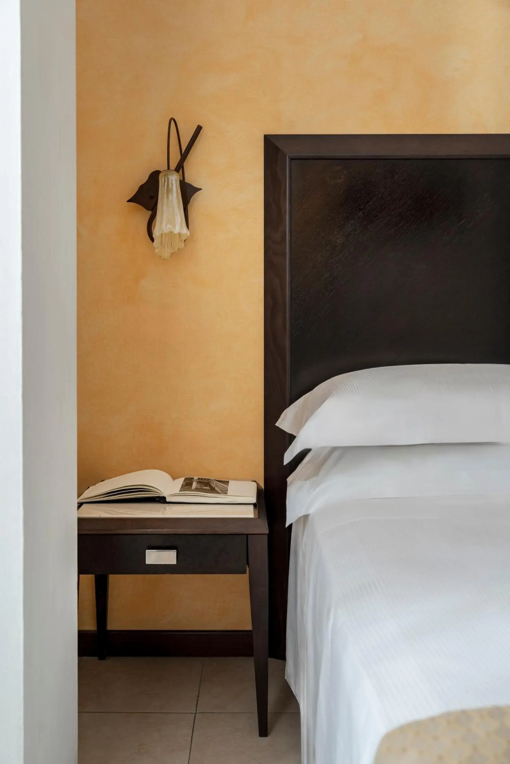 Bed in Hotel Du Soleil Bed in Hotel Du Soleil