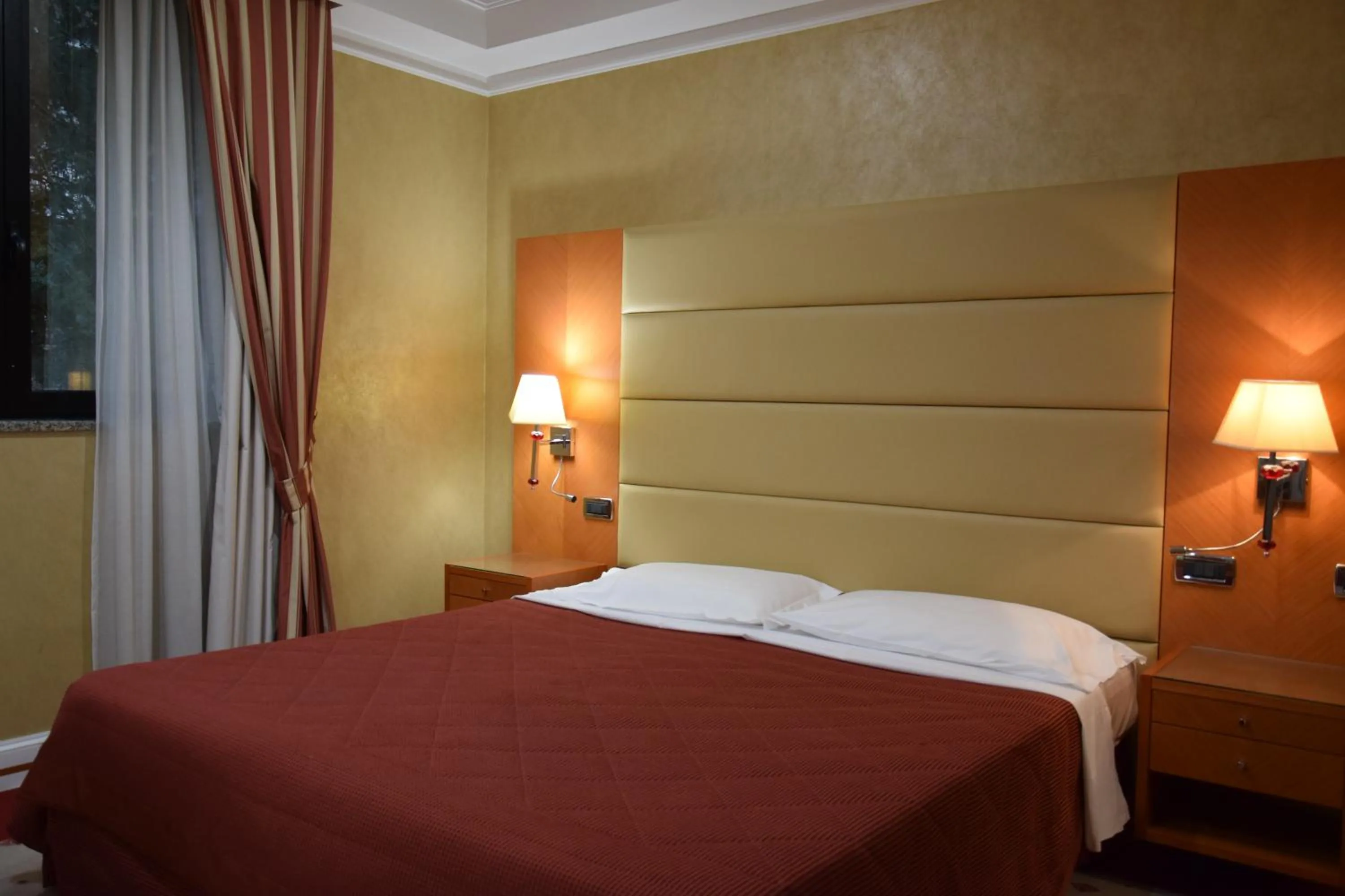 Bed in Hotel Perusia